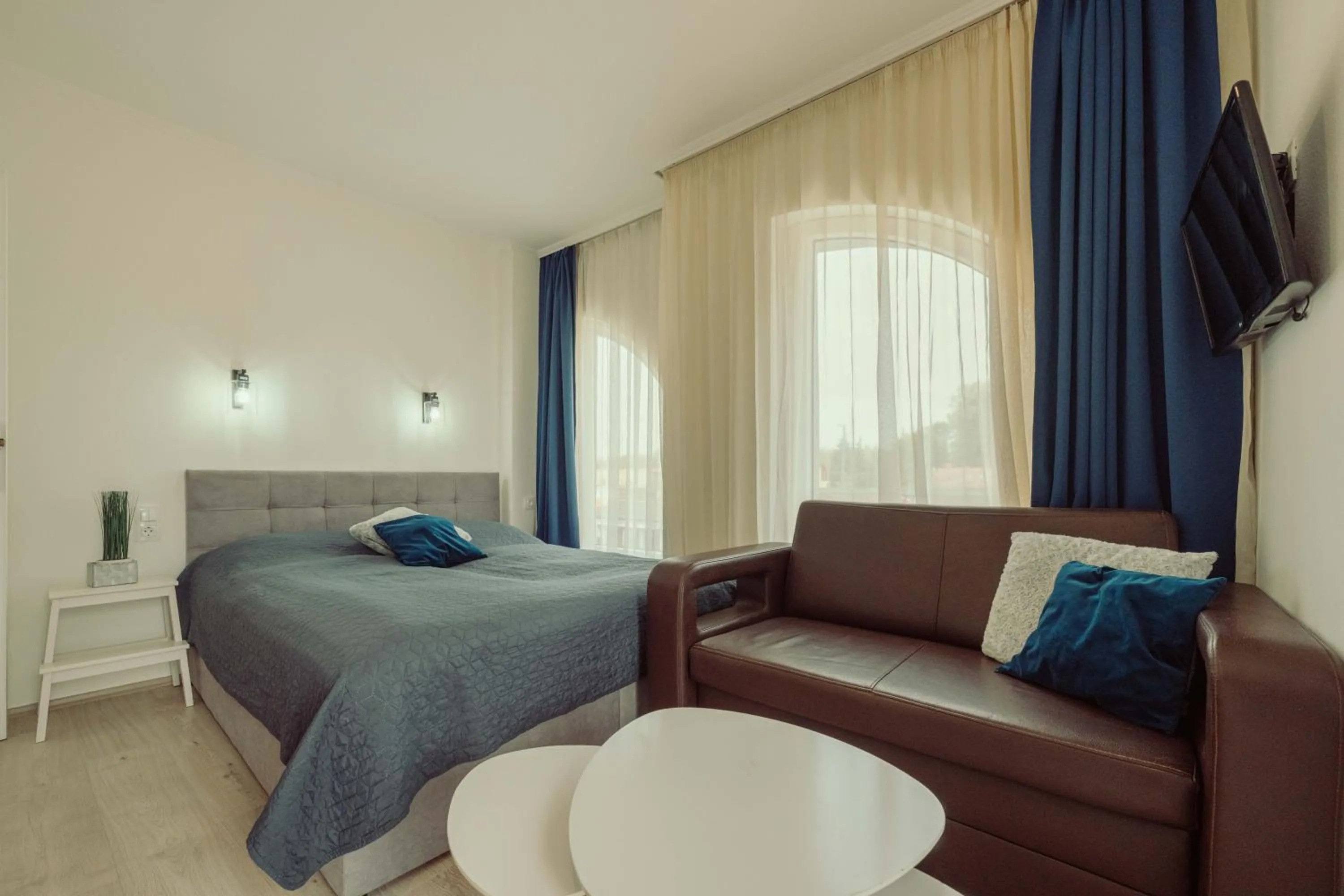 Bed in Caesar Apartments & Rooms