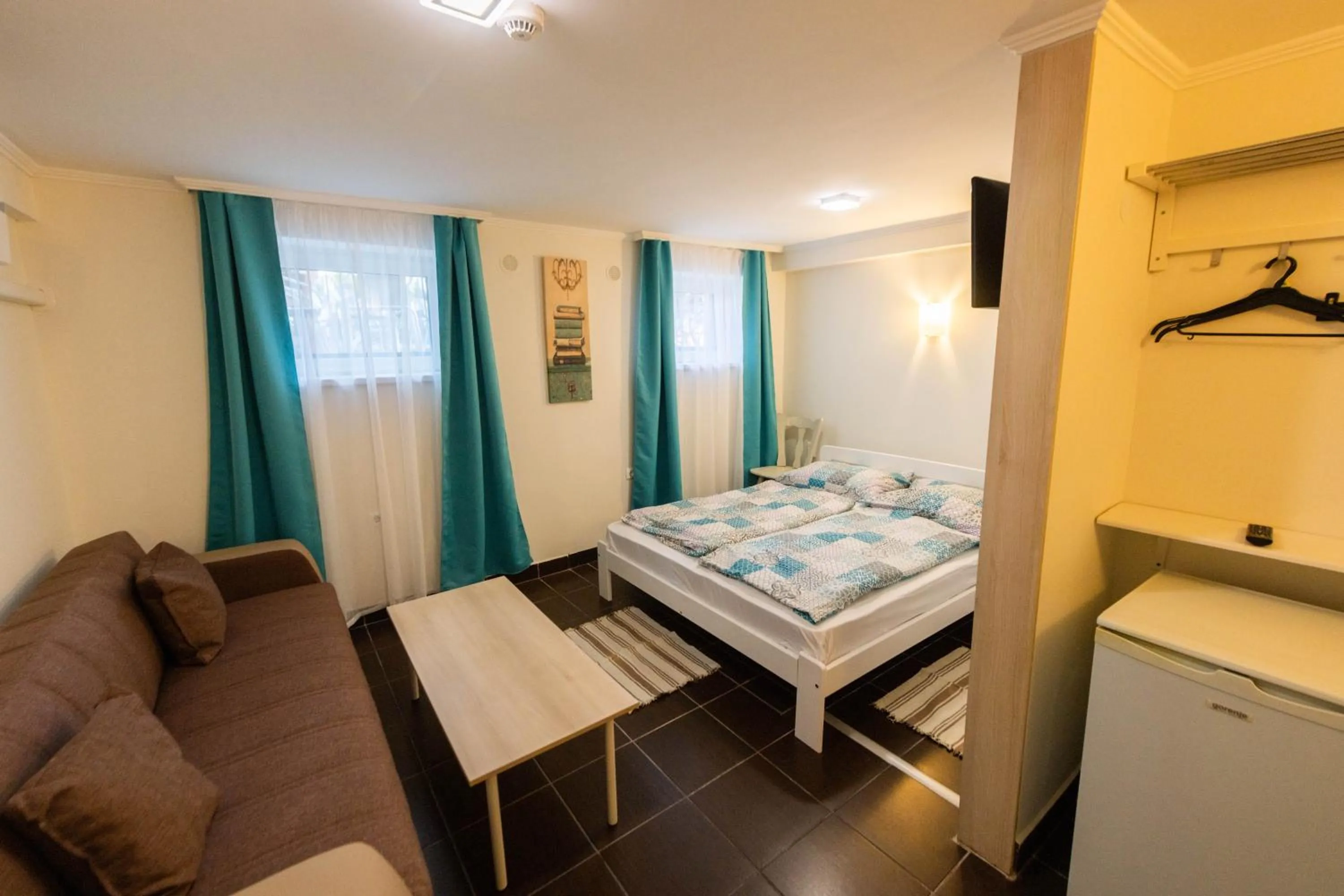 Bedroom, Bed in Caesar Apartments & Rooms