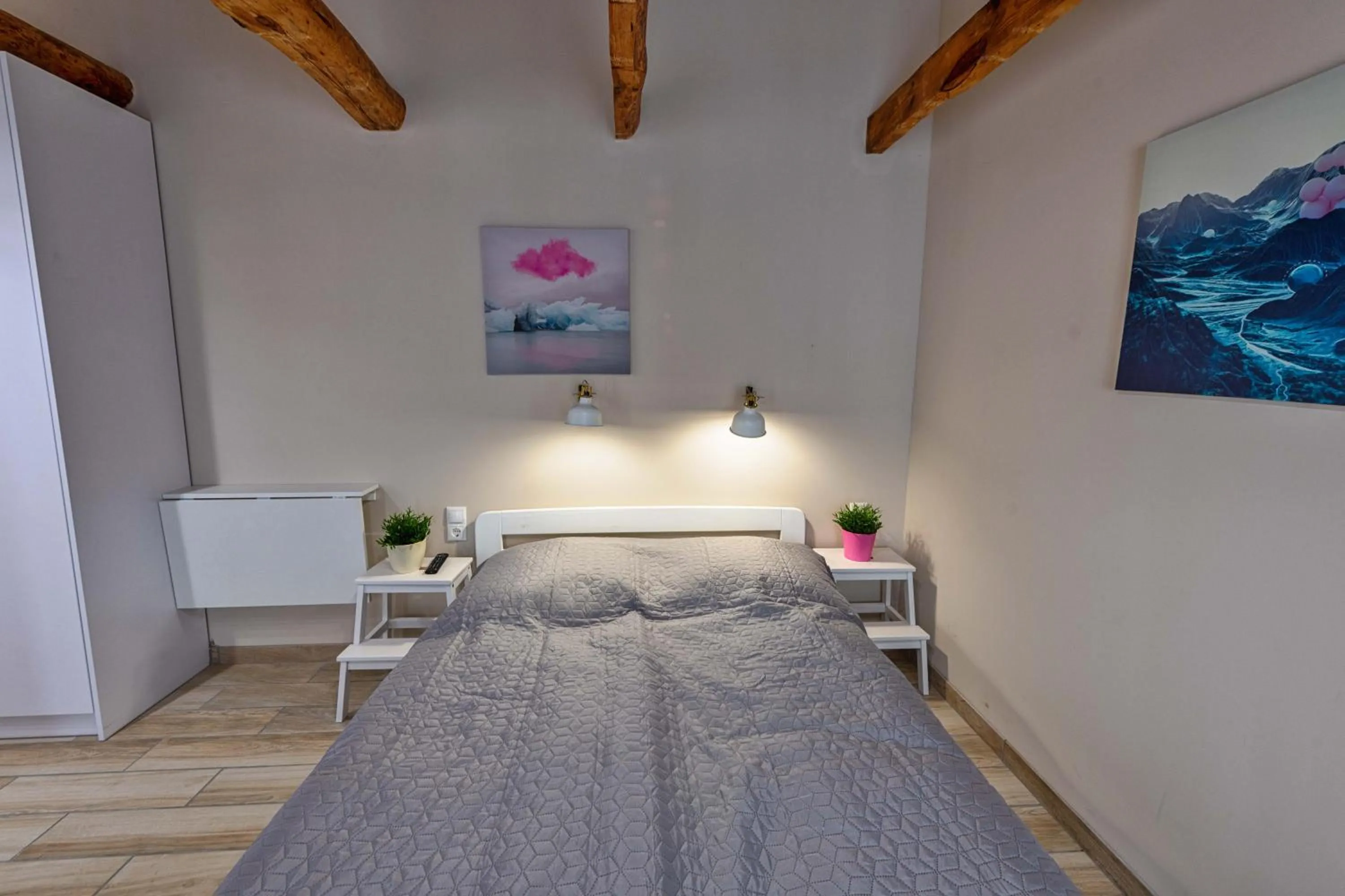 Bed in Caesar Apartments & Rooms