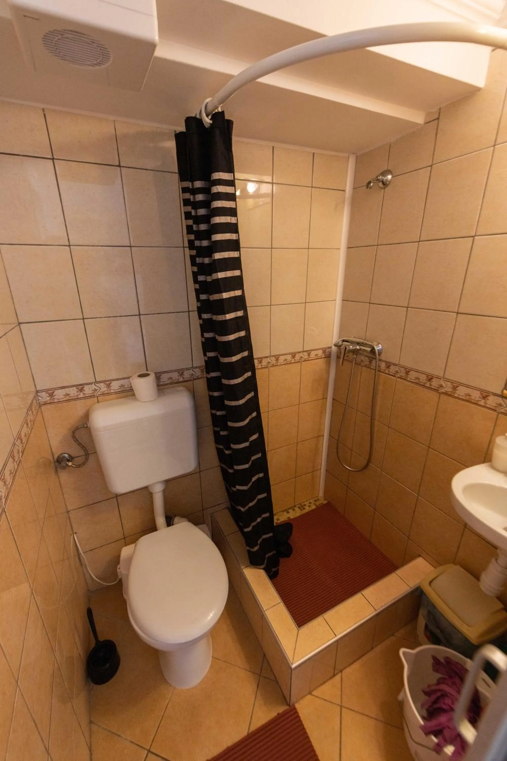Bathroom in Caesar Apartments & Rooms