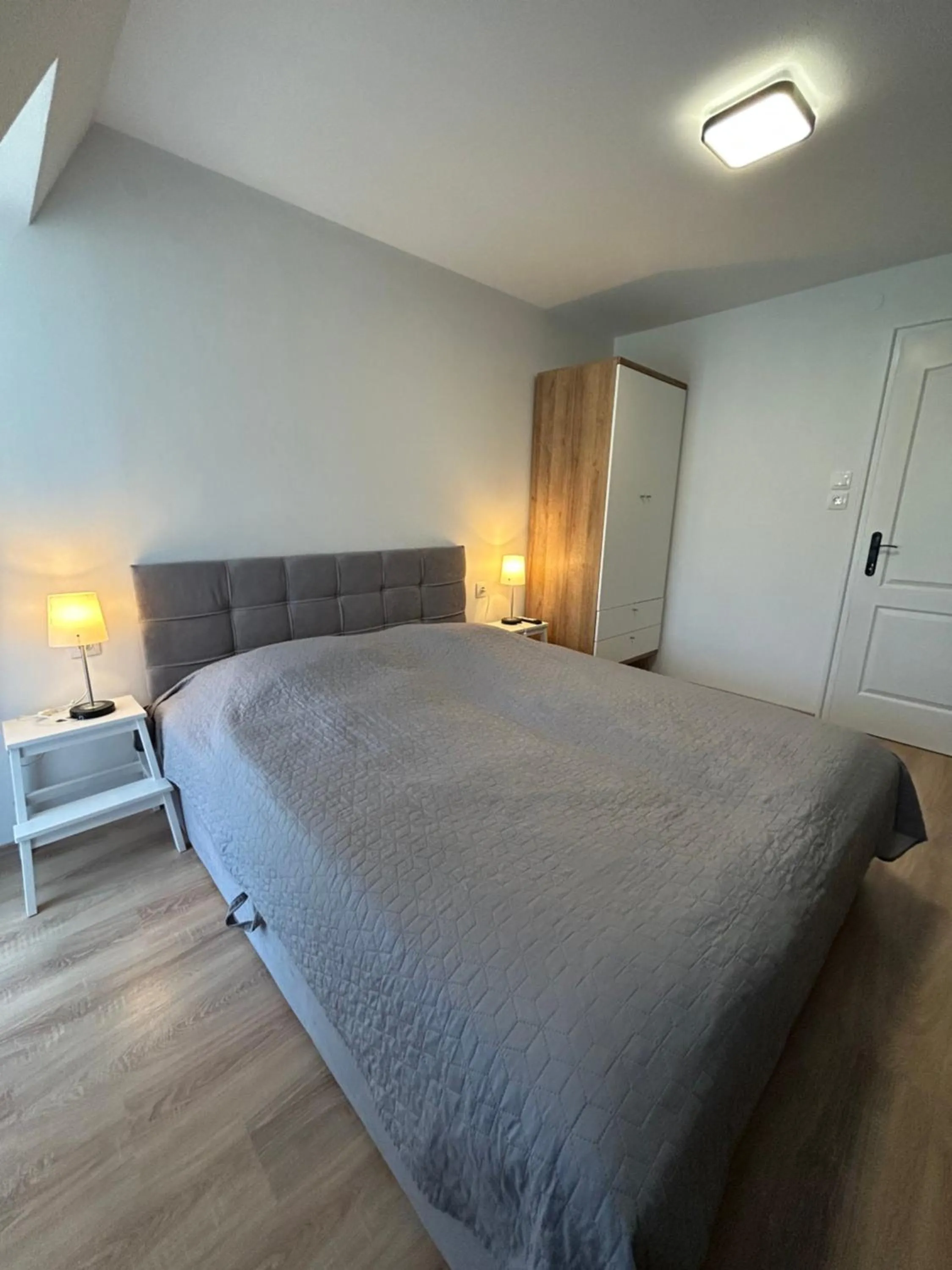 Bed in Caesar Apartments & Rooms