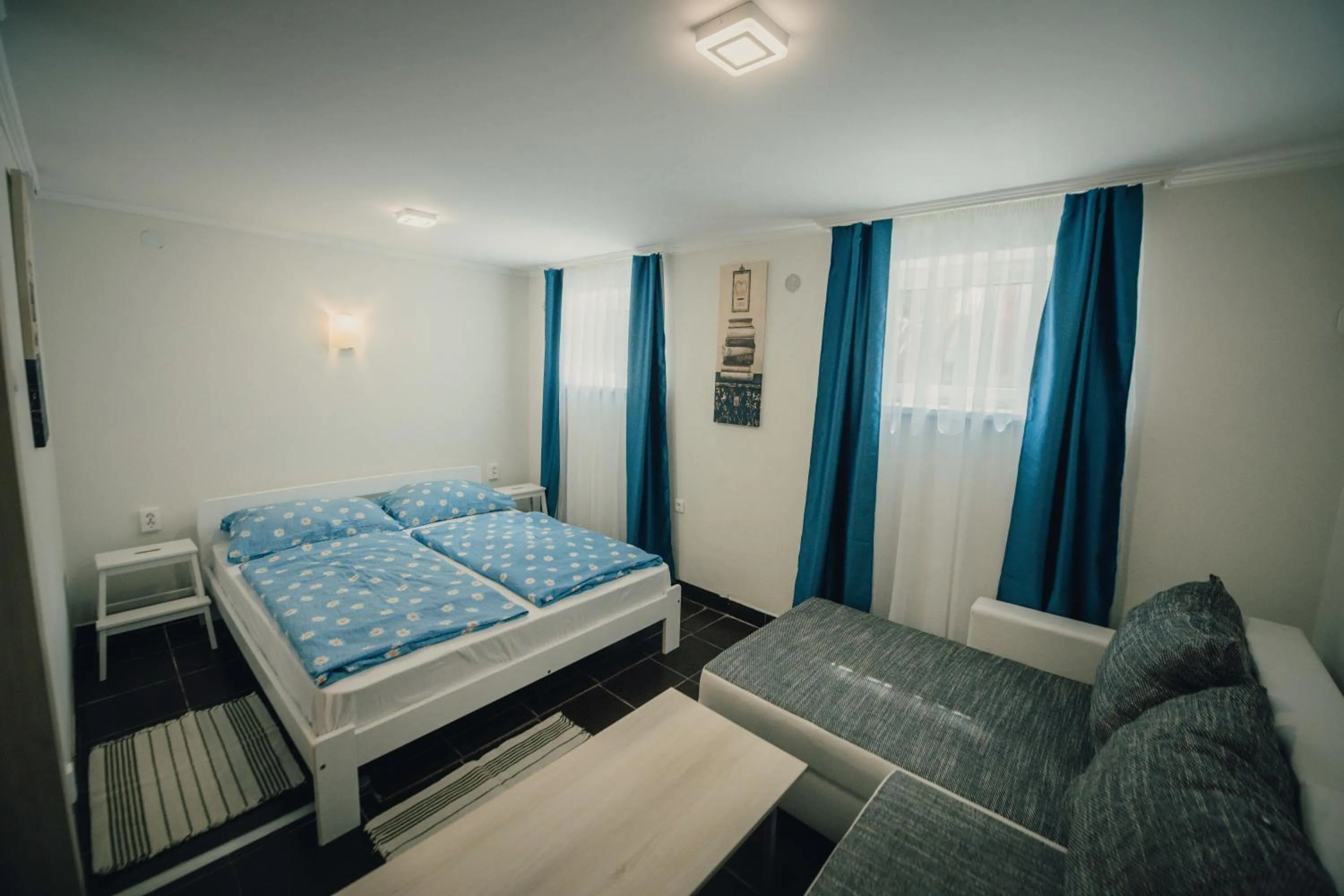 Bedroom, Bed in Caesar Apartments & Rooms