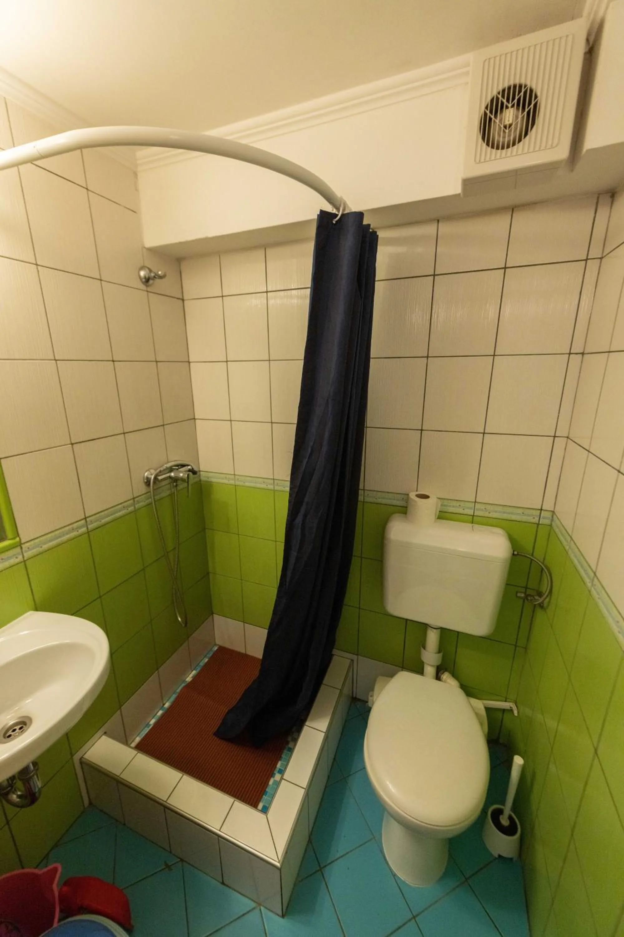 Bathroom in Caesar Apartments & Rooms