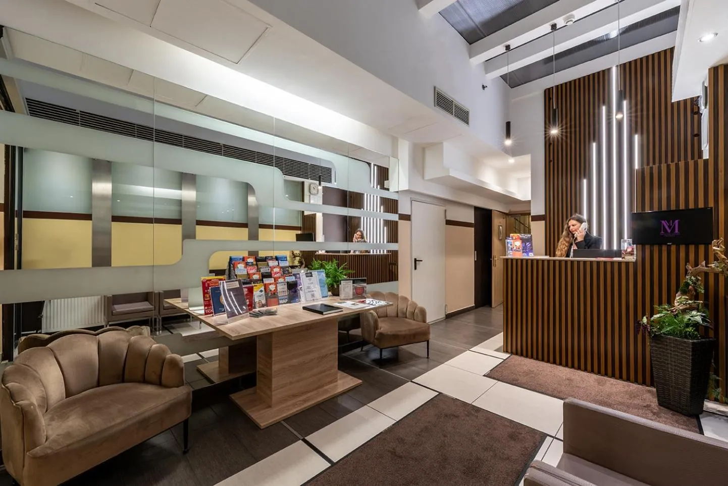 Lobby or reception in Promenade City Hotel