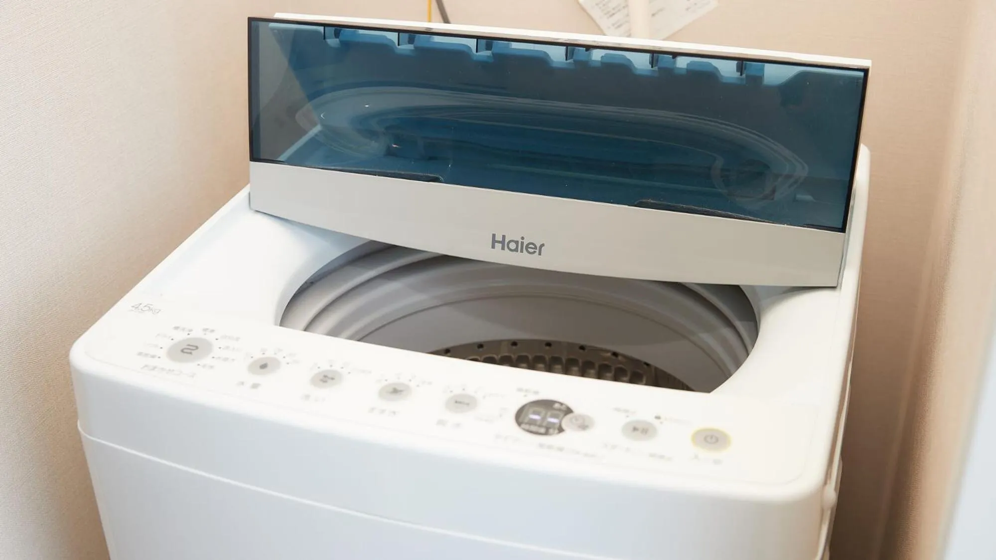 washing machine in New Normal Hotel in MATSUYAMA ニューノーマルホテルイン松山