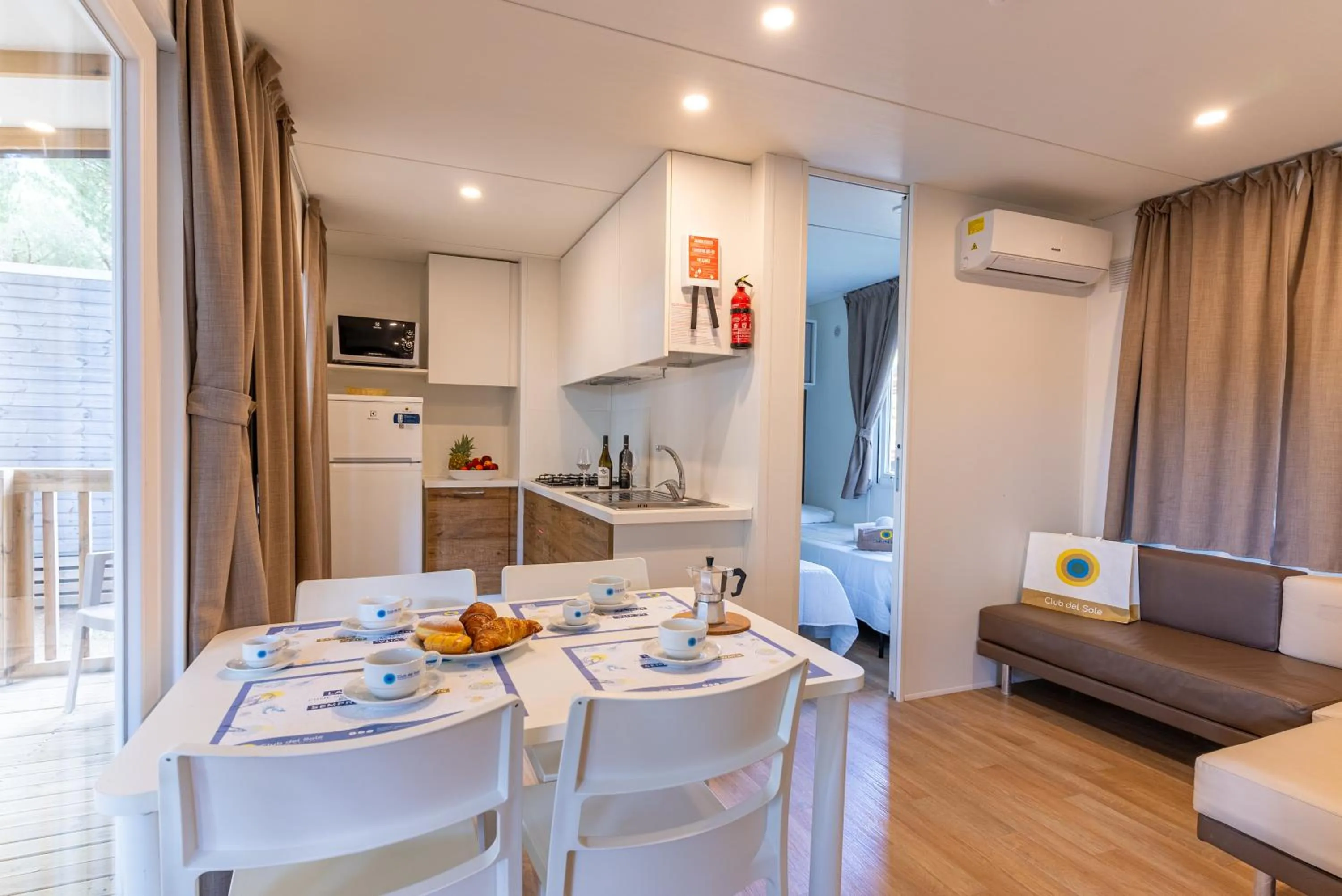 Dining area in Club del Sole Orbetello Family Collection