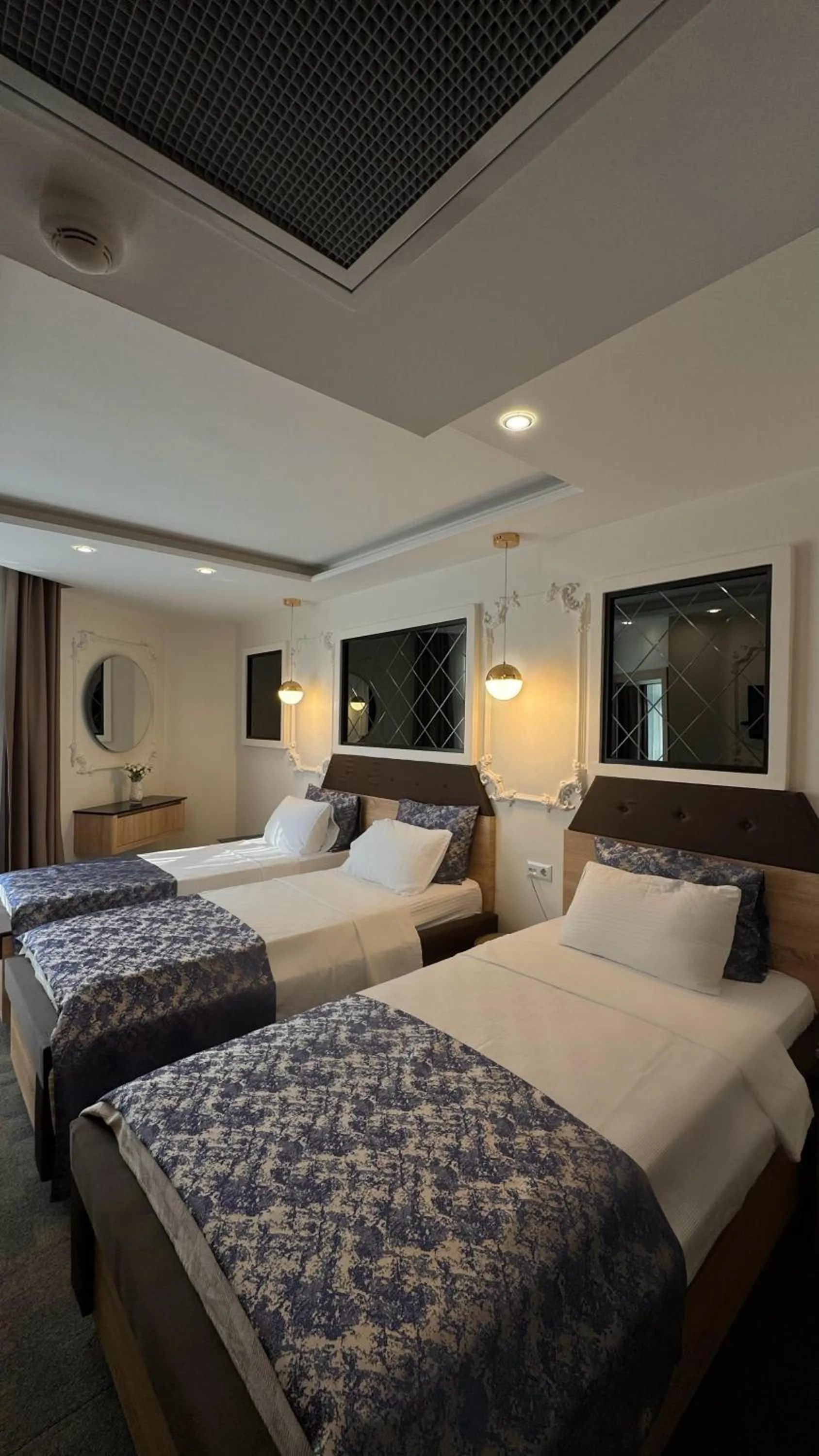 Bed in AYDINLI HOTEL