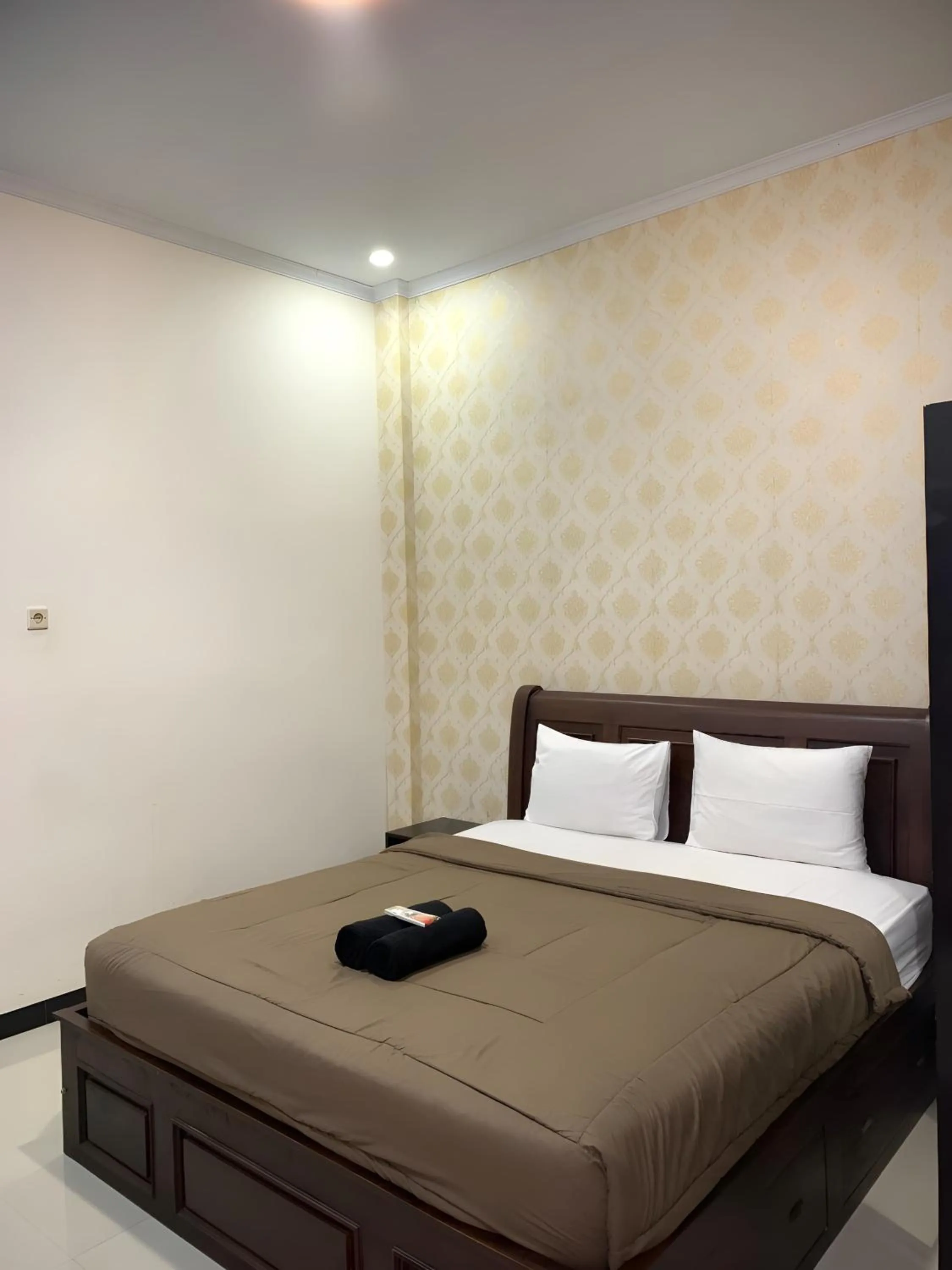 Bed in Prime Adisucipto Hotel