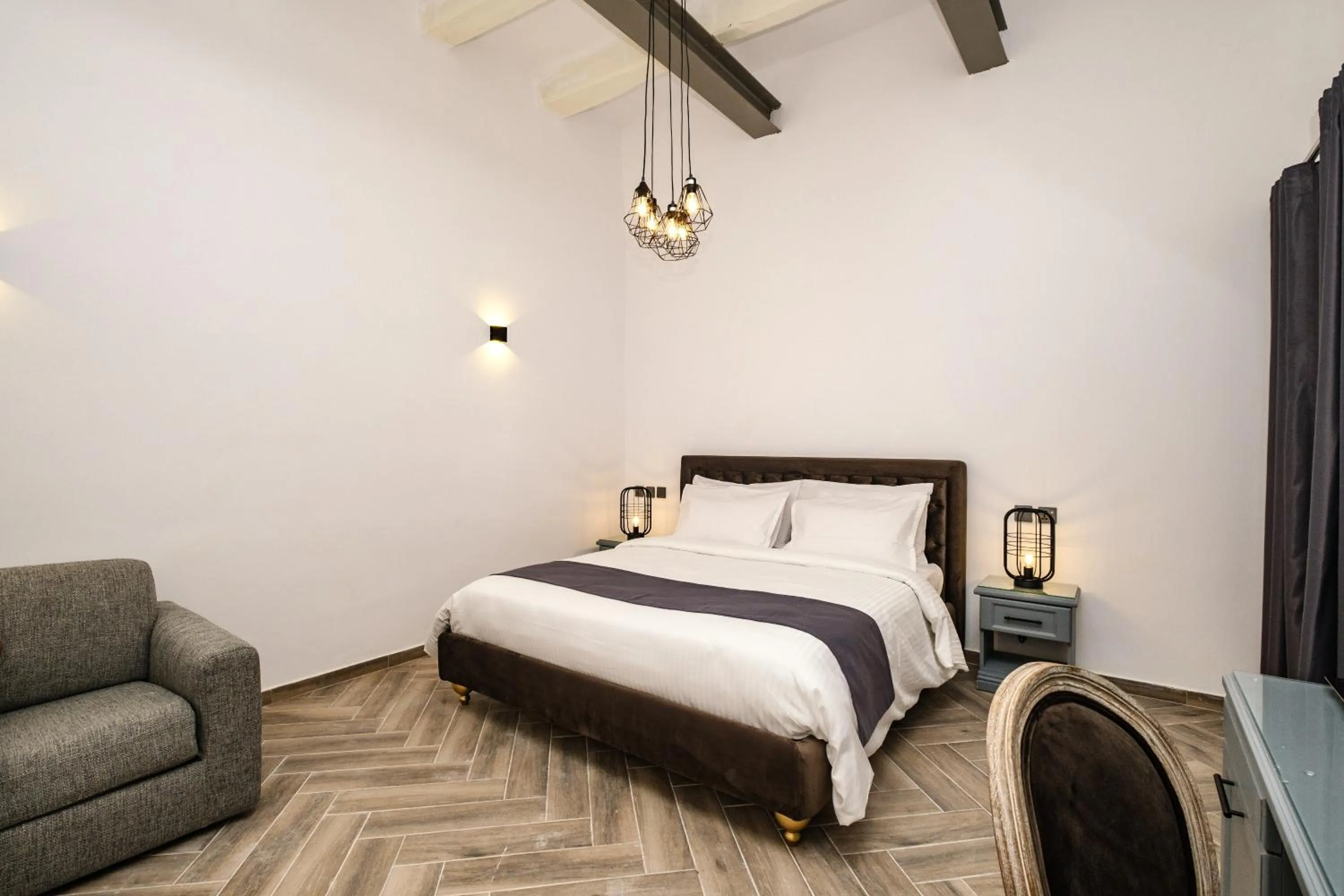 Decorative detail, Bed in Casa Reale Boutique Hotel