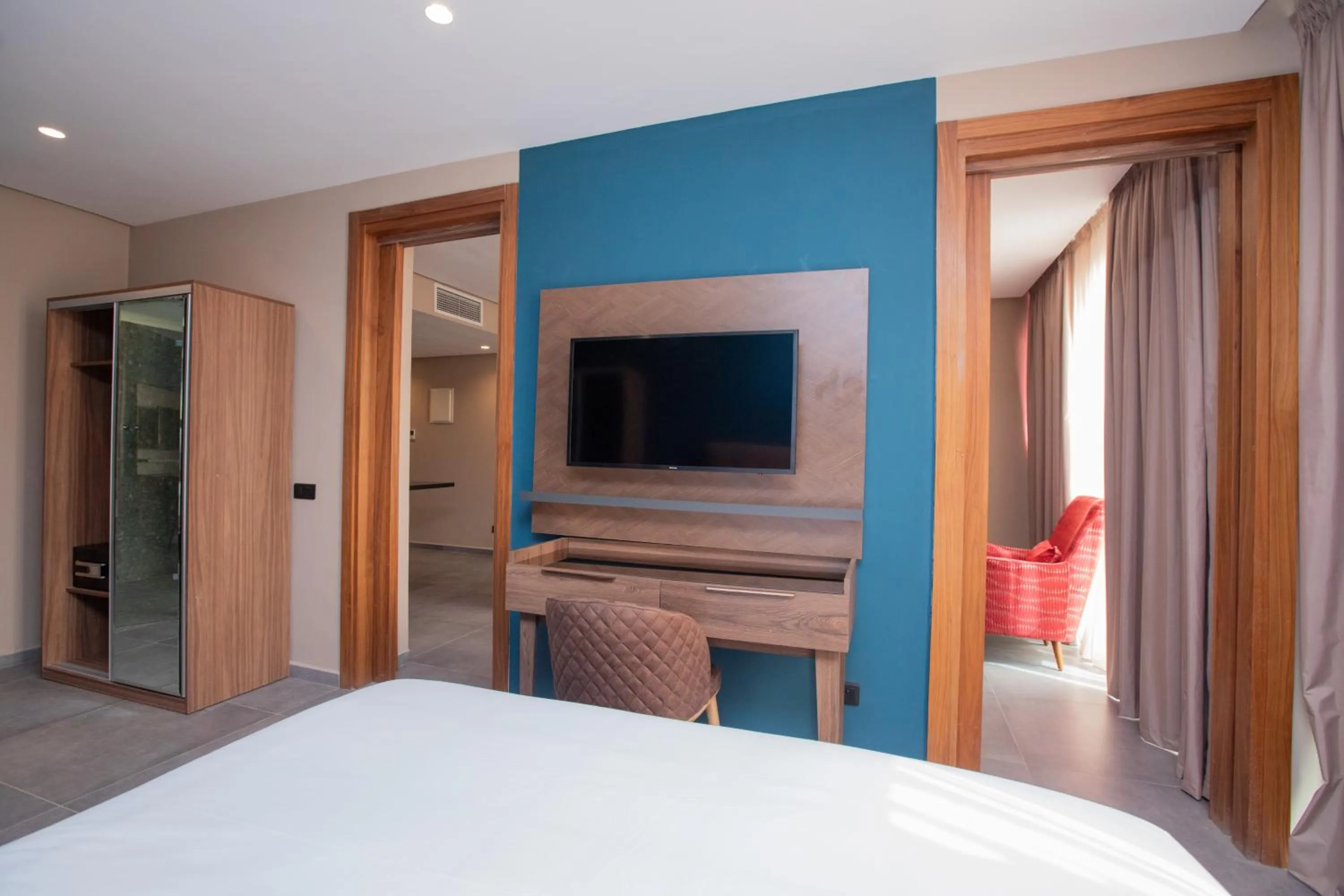 Communal lounge/ TV room, Bed in Address Hotel Casablanca