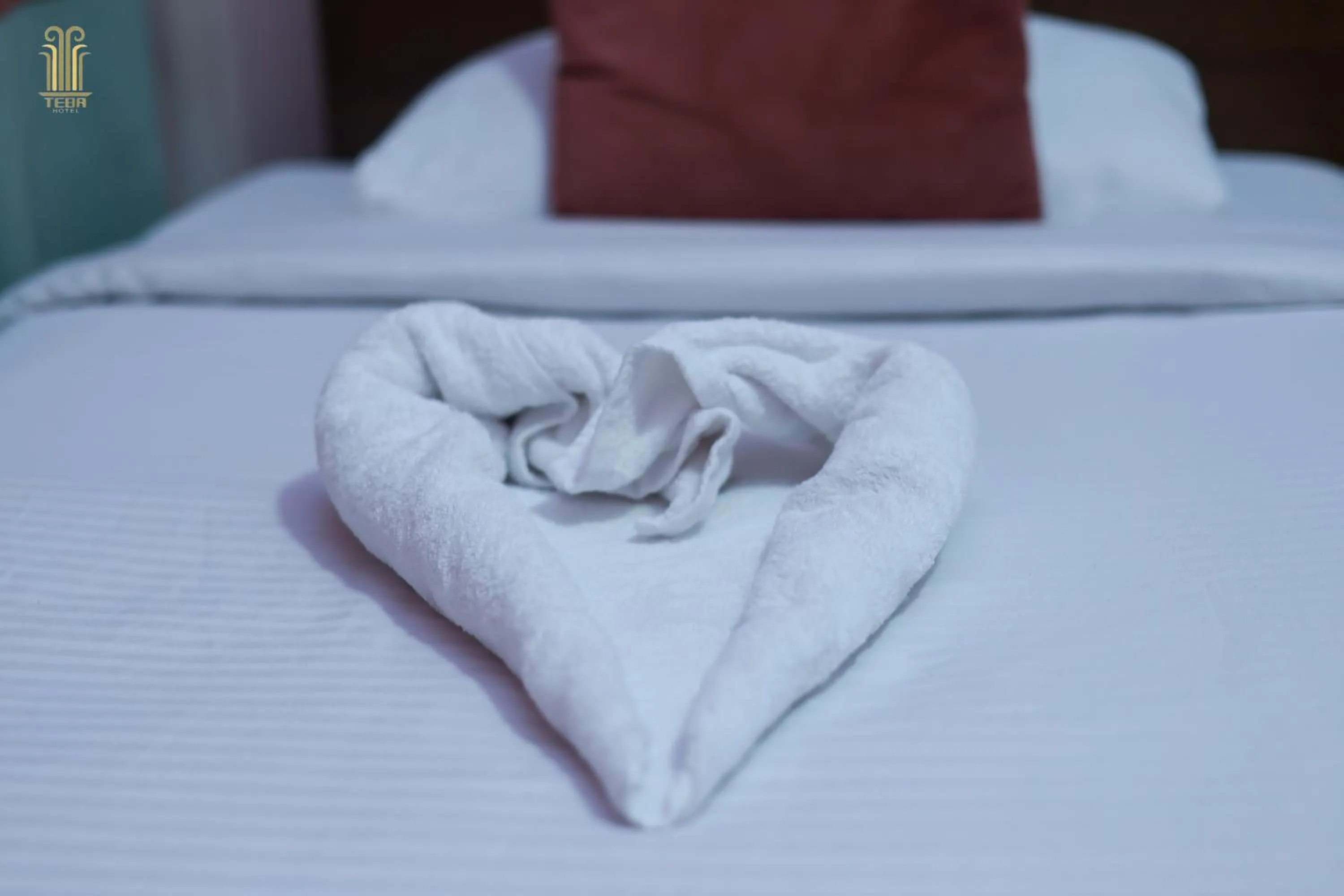 Property building, Bed in Tiba Hotel