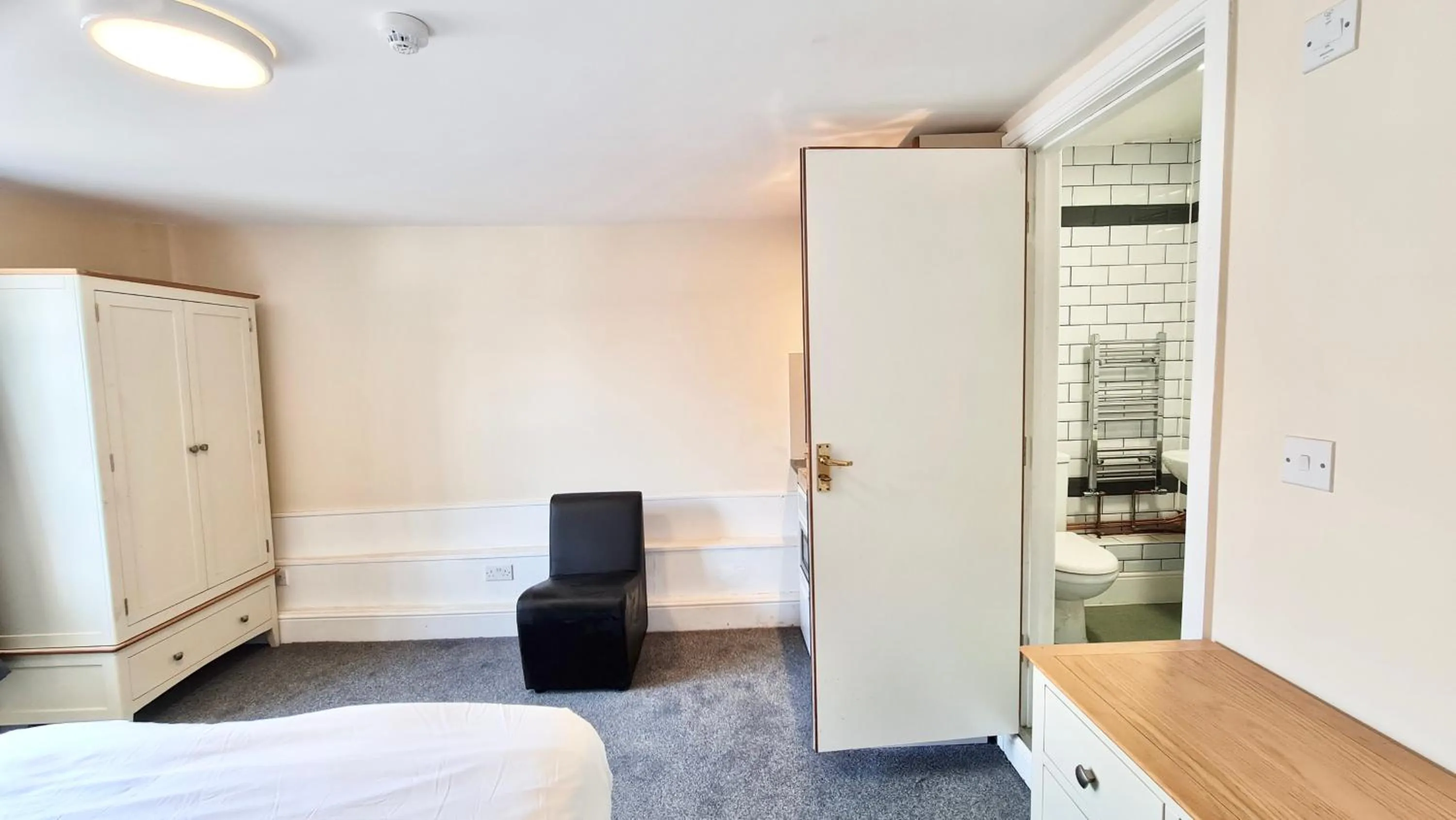 Bedroom, Bed in Grace Apartments - Living Rock