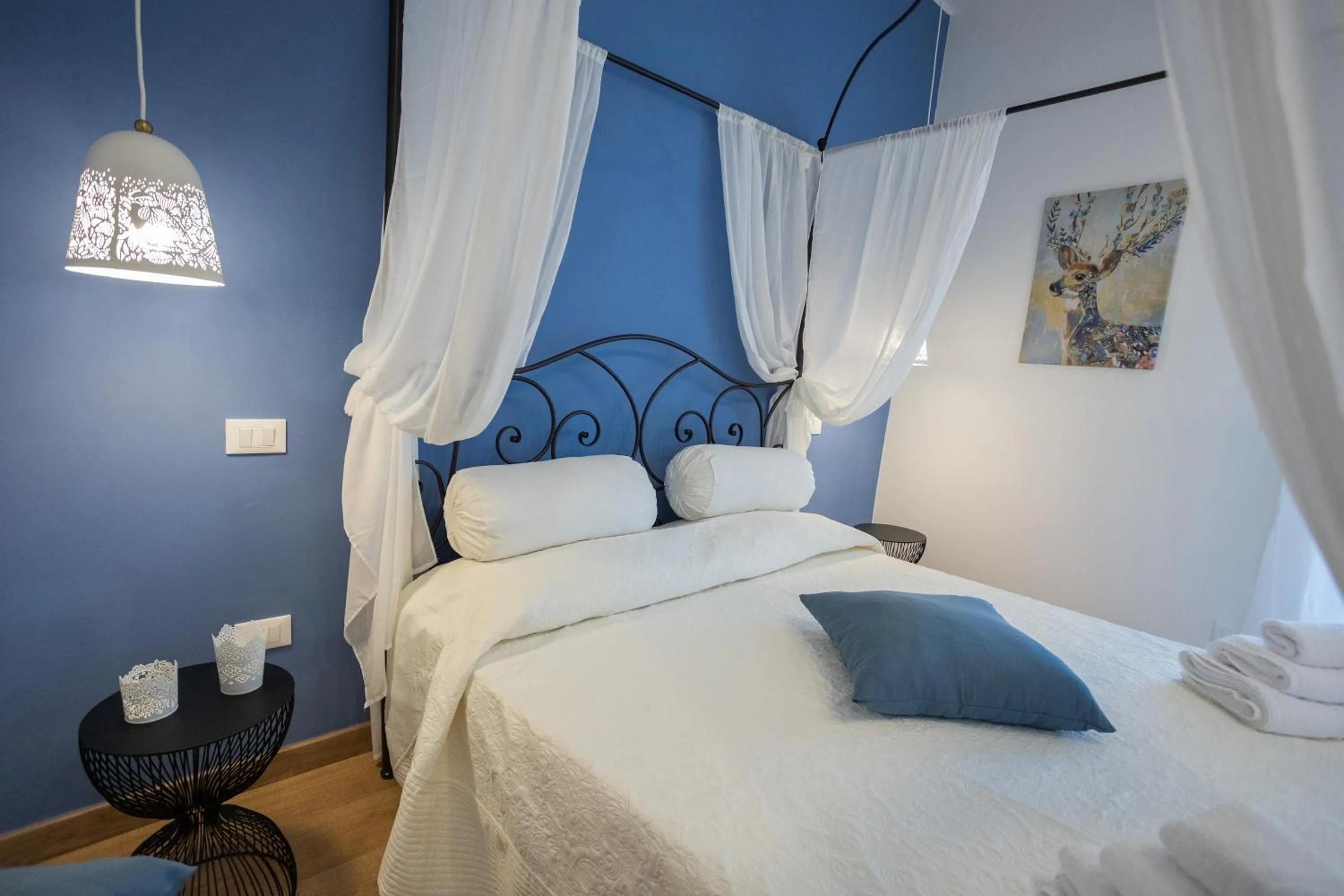 Bed in EXCLUSIVE ROOMS Al Vicoletto