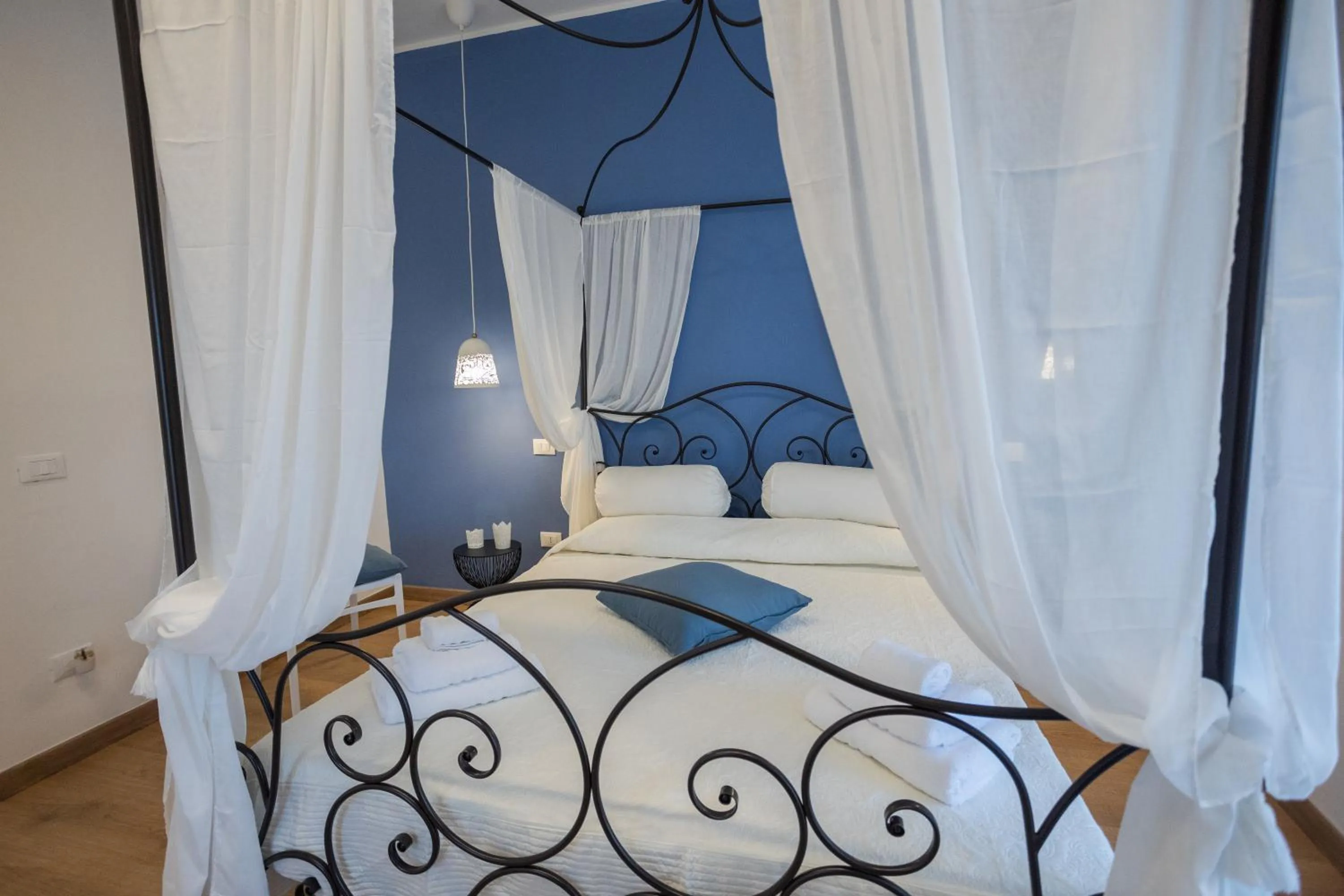 Bed in EXCLUSIVE ROOMS Al Vicoletto