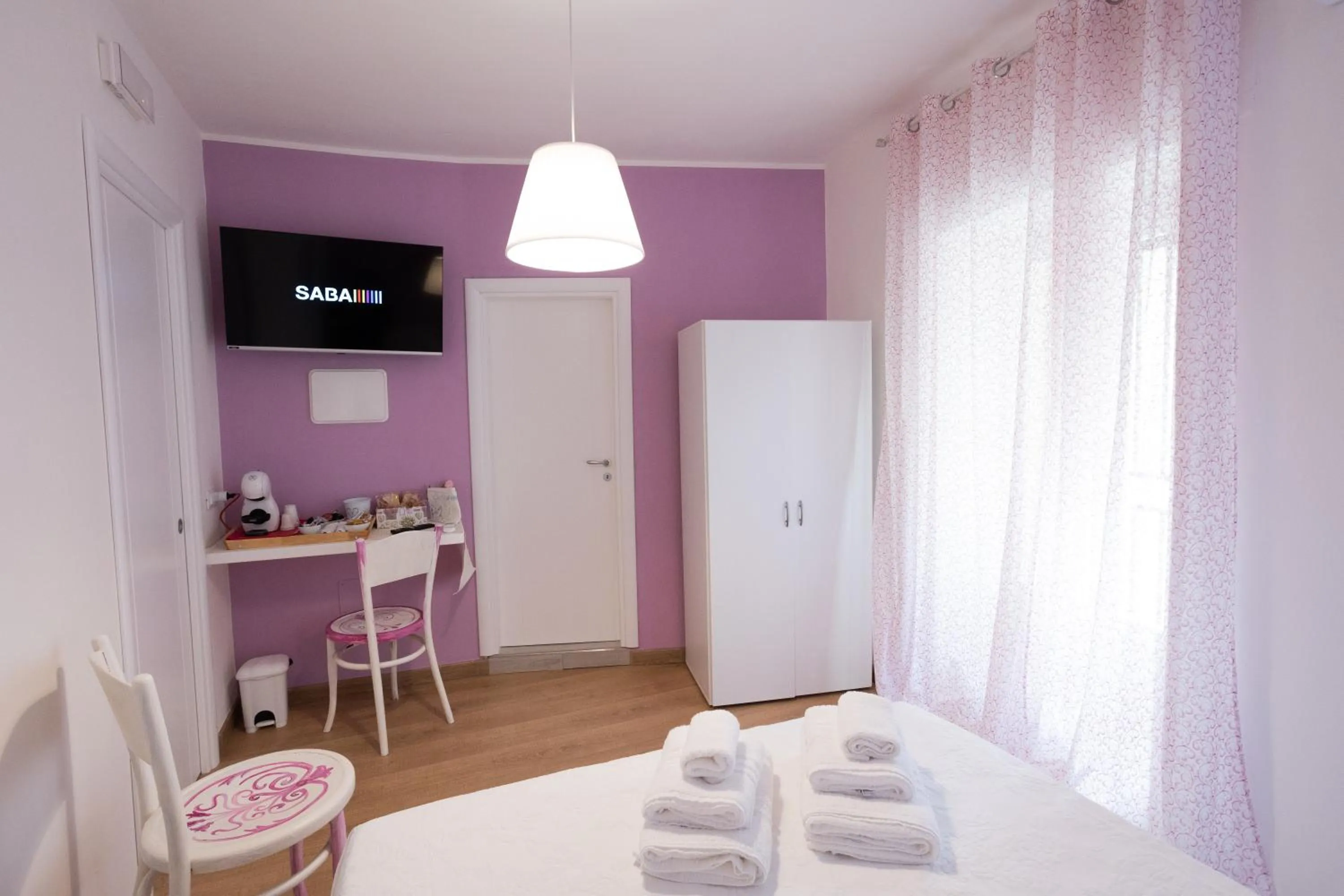 Bed in EXCLUSIVE ROOMS Al Vicoletto