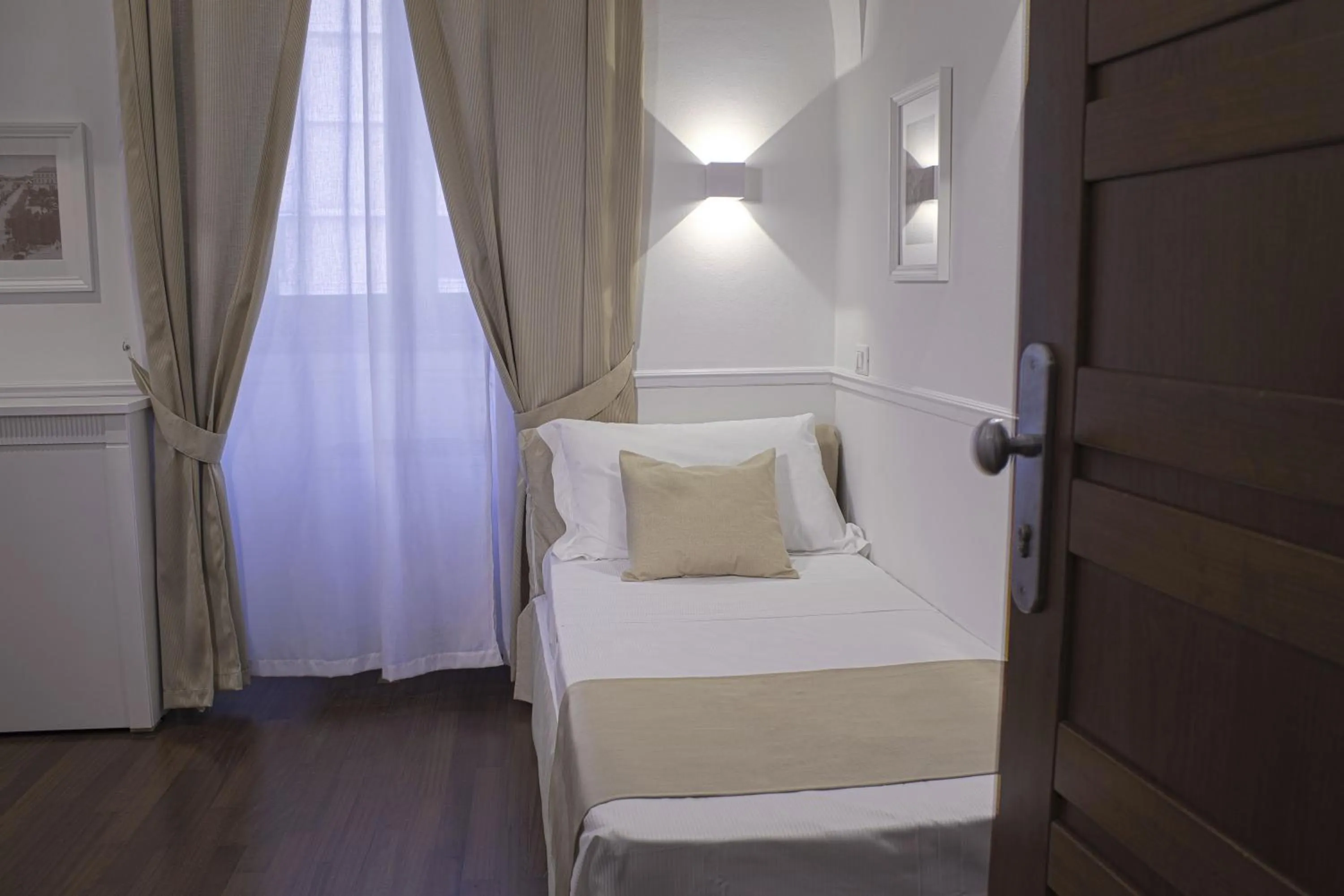 Bed in Palazzo Sant'Elena Historic Hotel