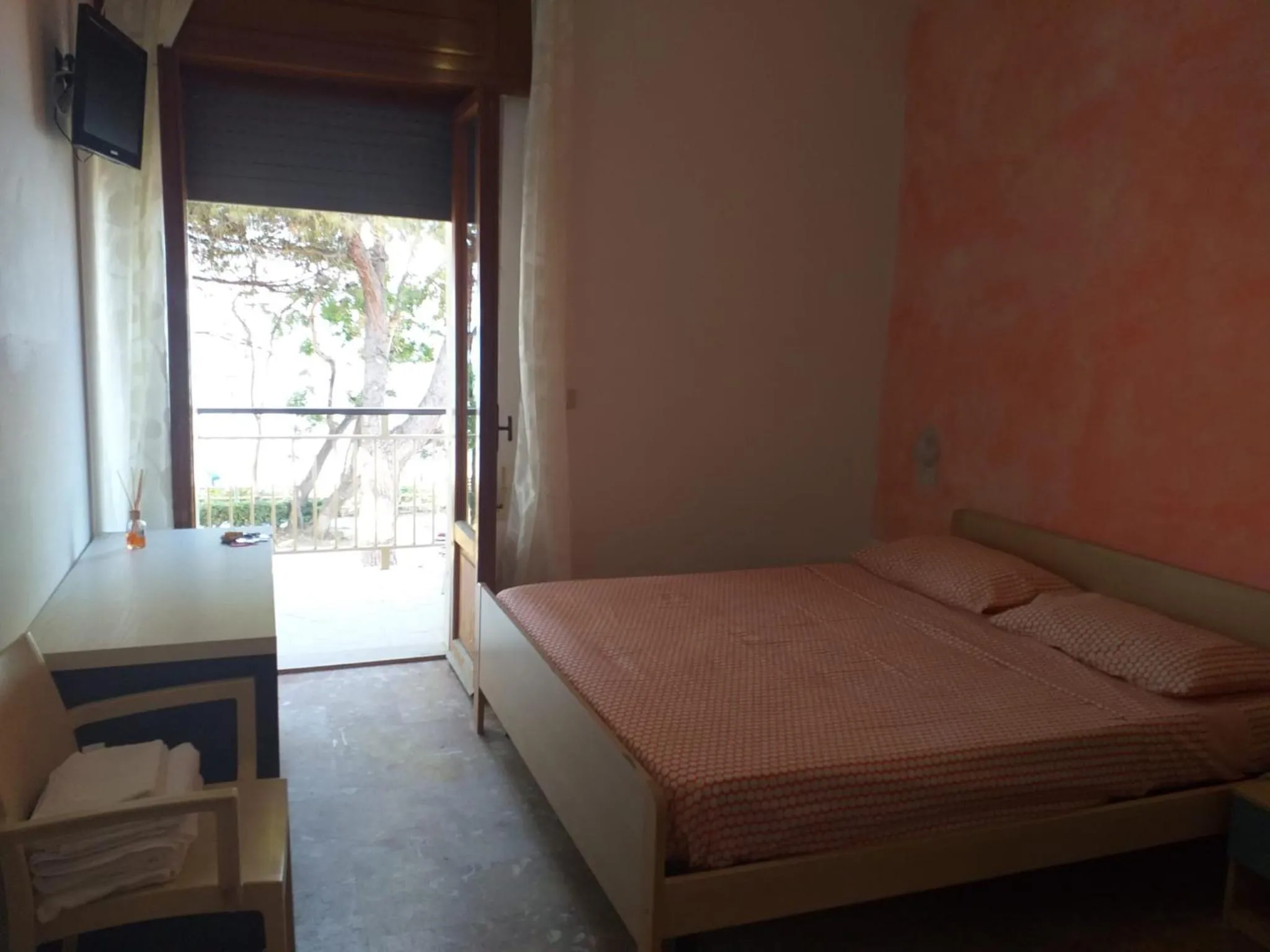 Bedroom, Bed in Spacious quadruple room a stone throw from the sea
