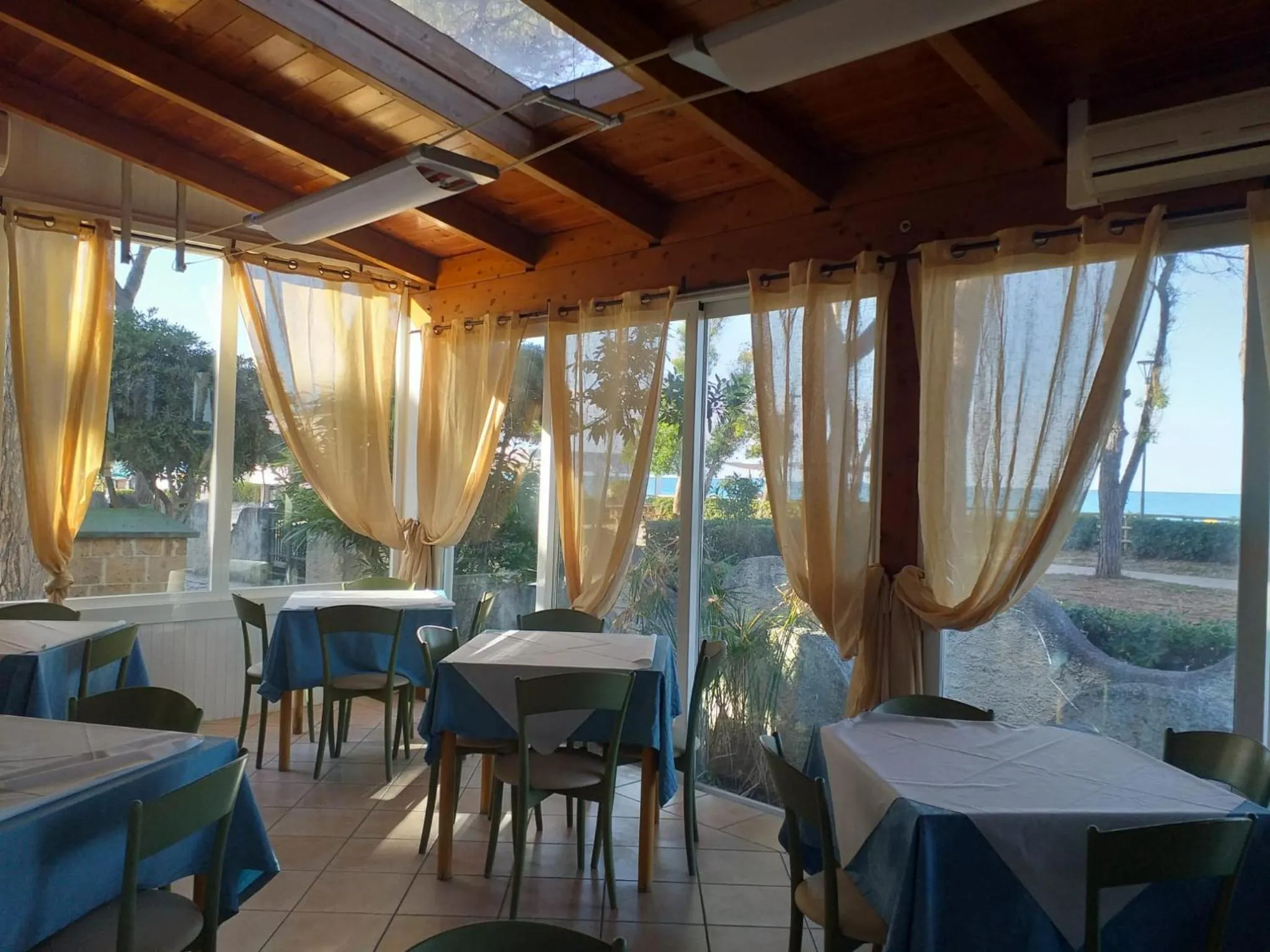 View (from property/room) in Spacious quadruple room a stone throw from the sea