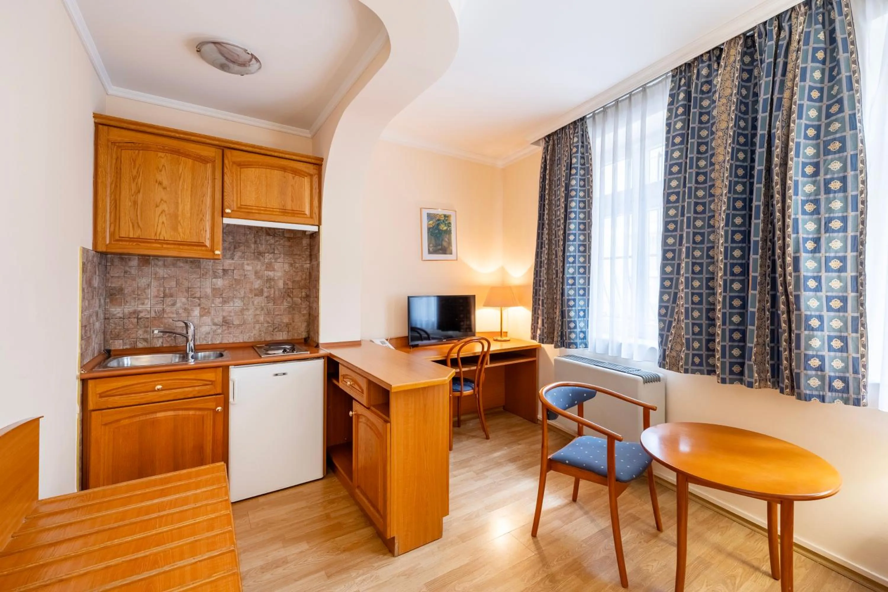 Kitchen or kitchenette in Hotel Pannonia