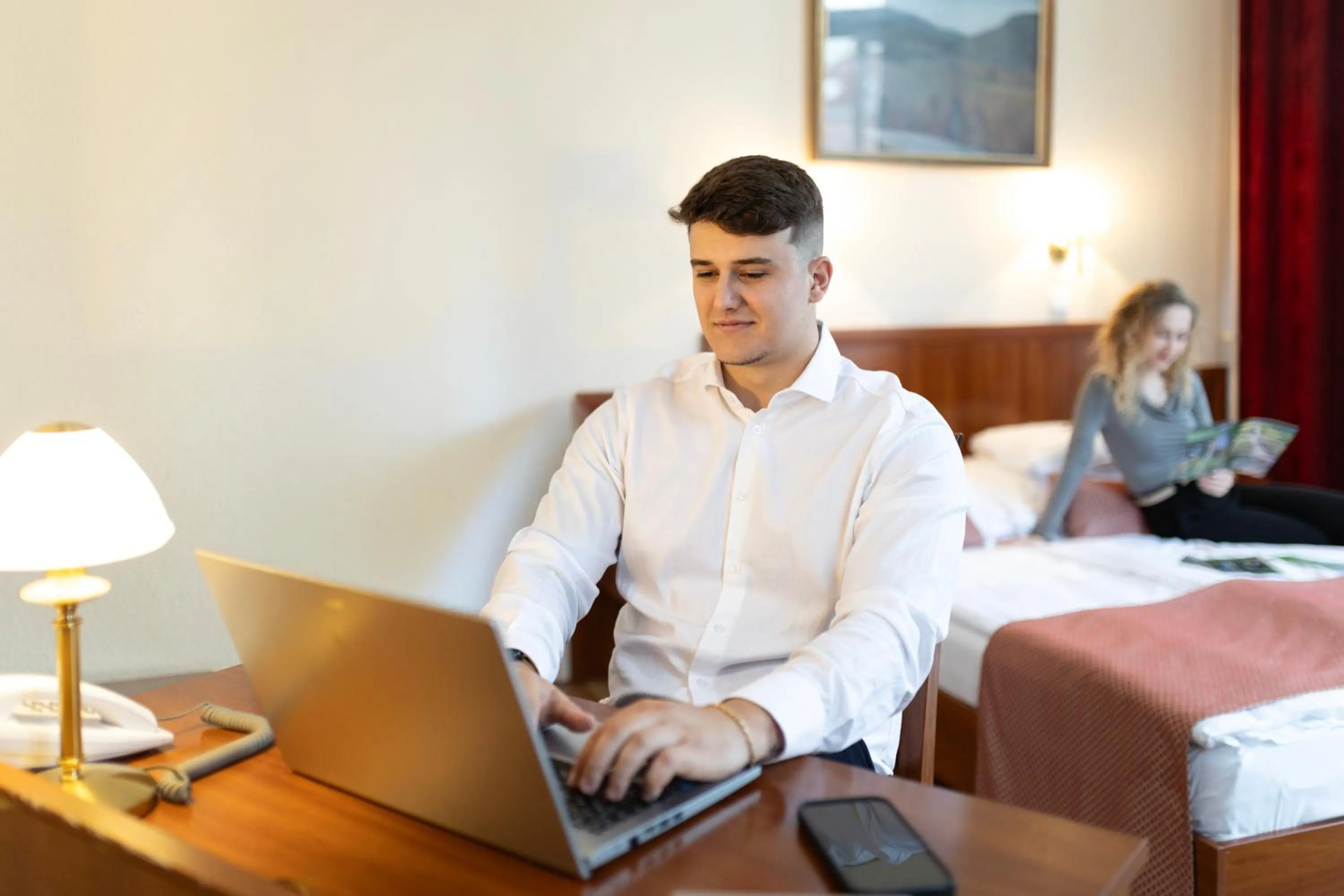 Seating area, Bed in Hotel Pannonia
