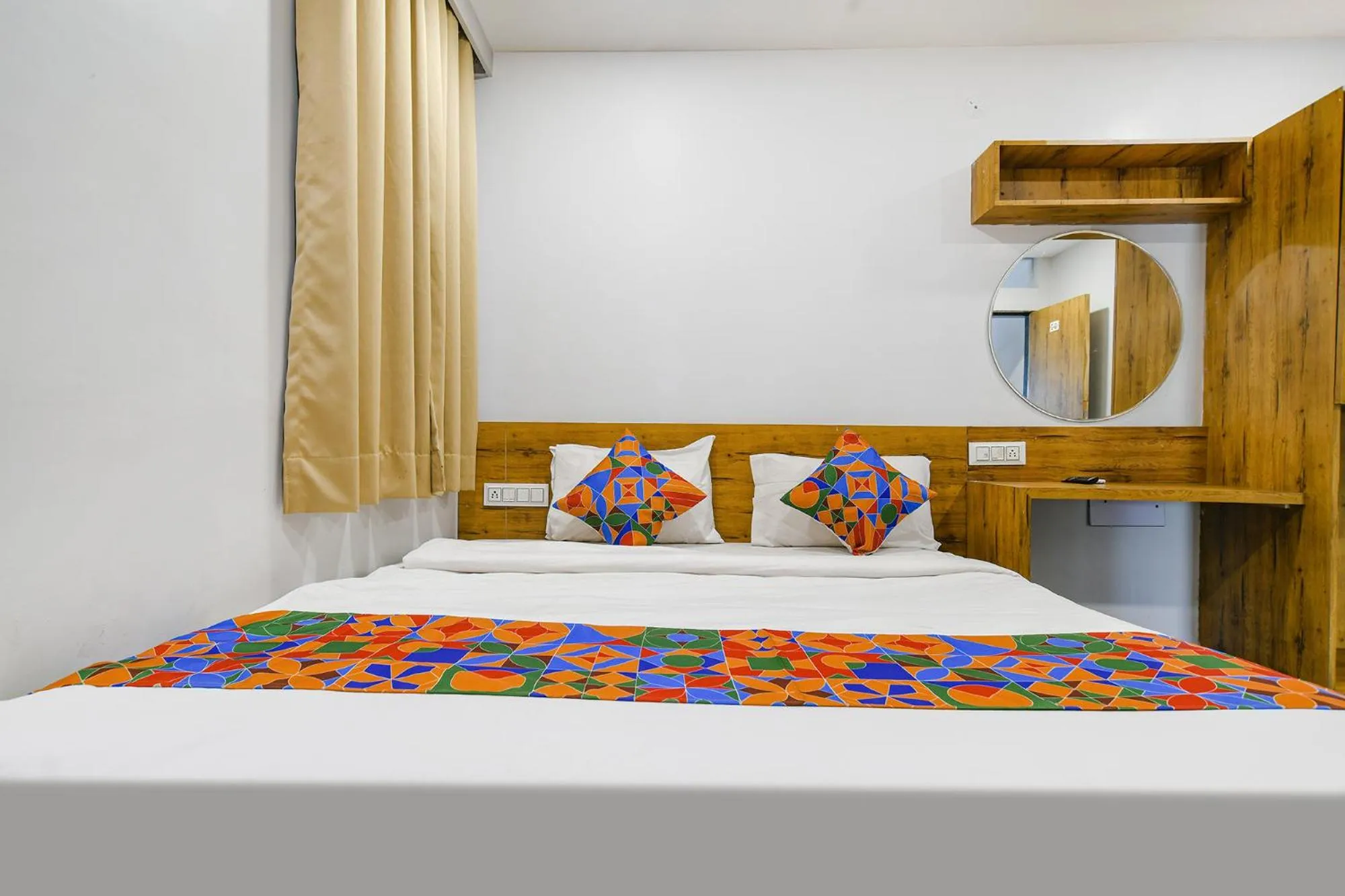 Bed in FabHotel Unity Landmark