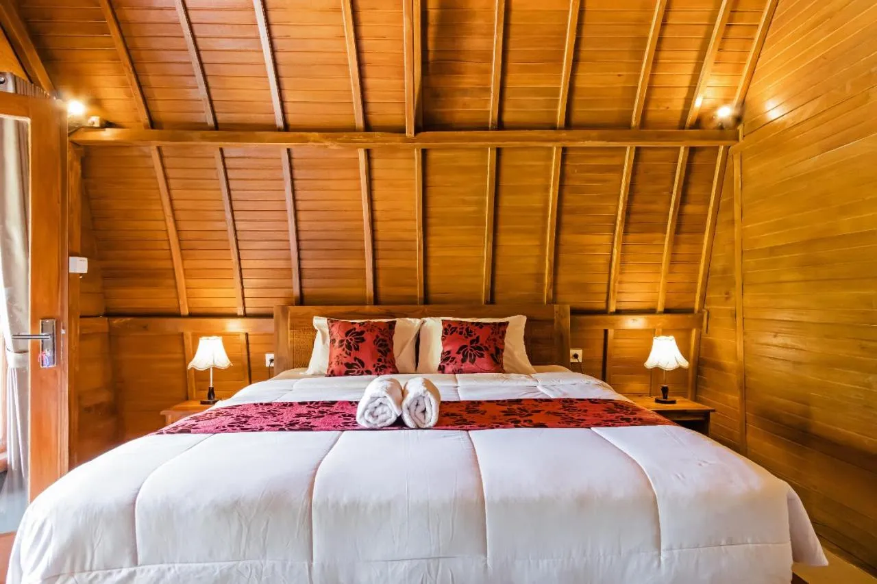 Bed in Kelingking Mesari Villa and Spa