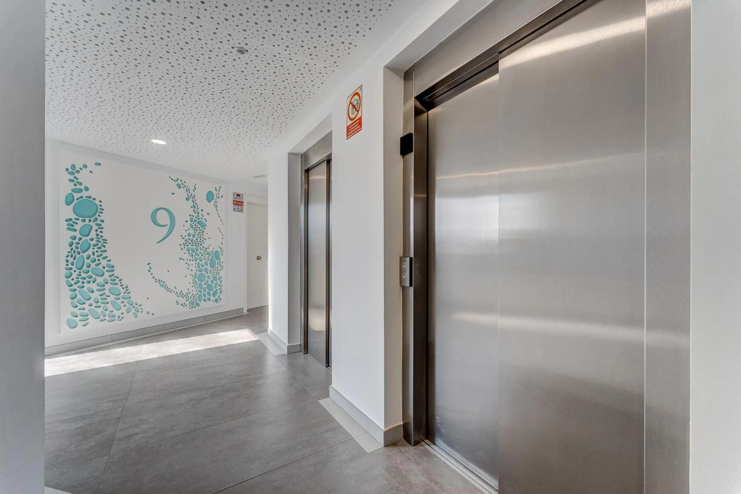 elevator in Ocean Garden Sunset & Sunrise - heated pool