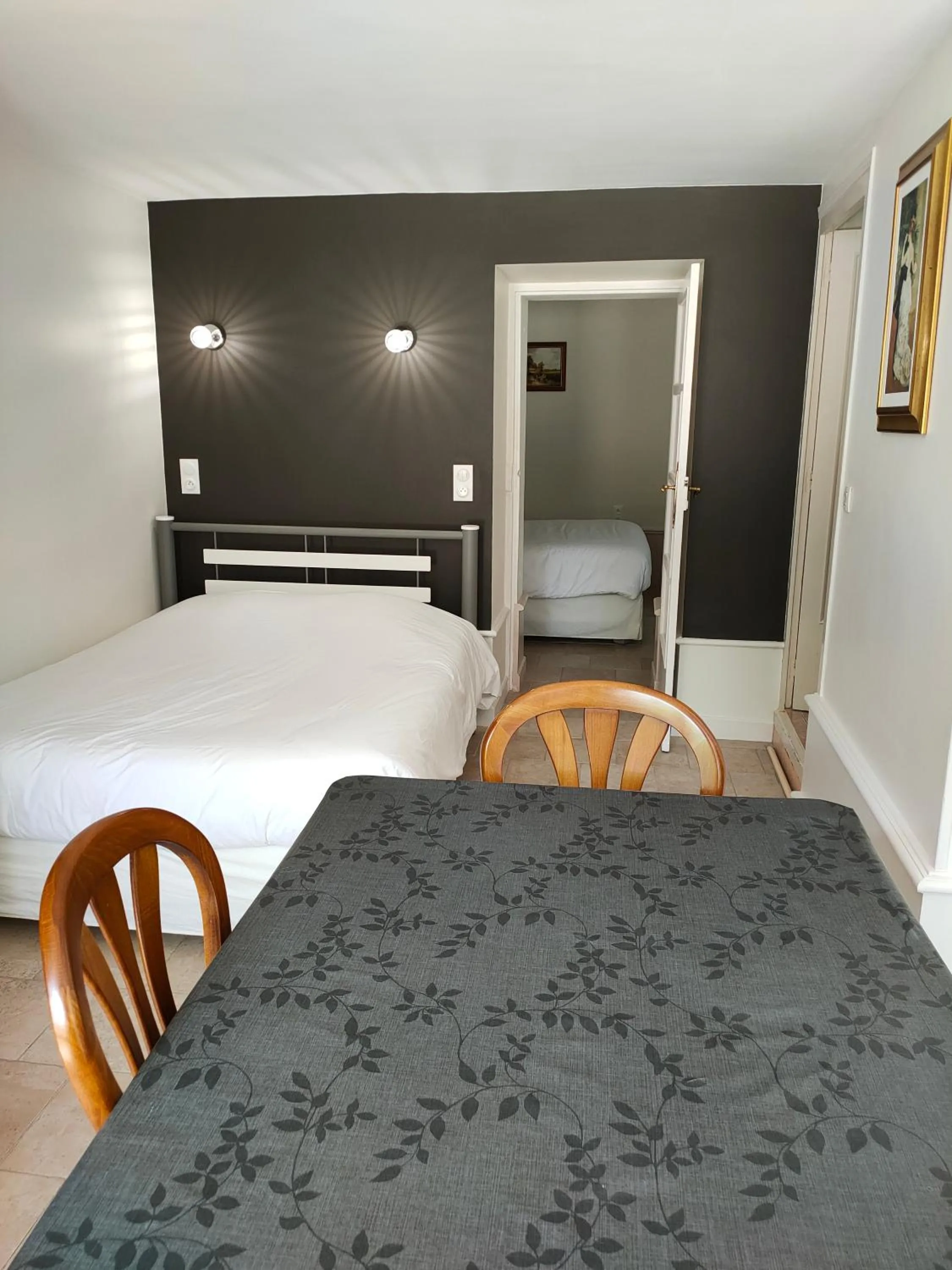 Photo of the whole room, Bed in Logis Manoir De La Giraudière