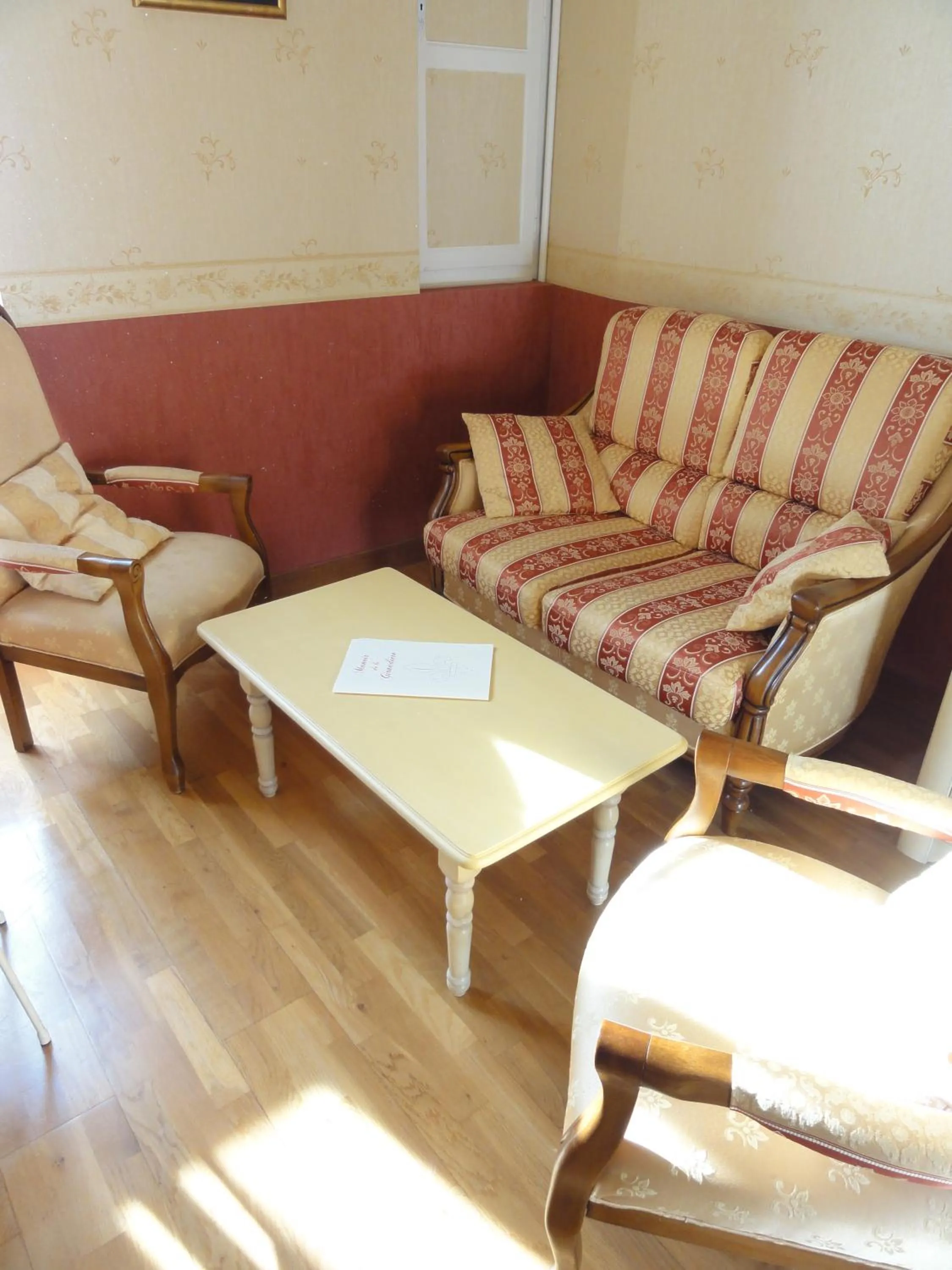 Seating area in Logis Manoir De La Giraudière