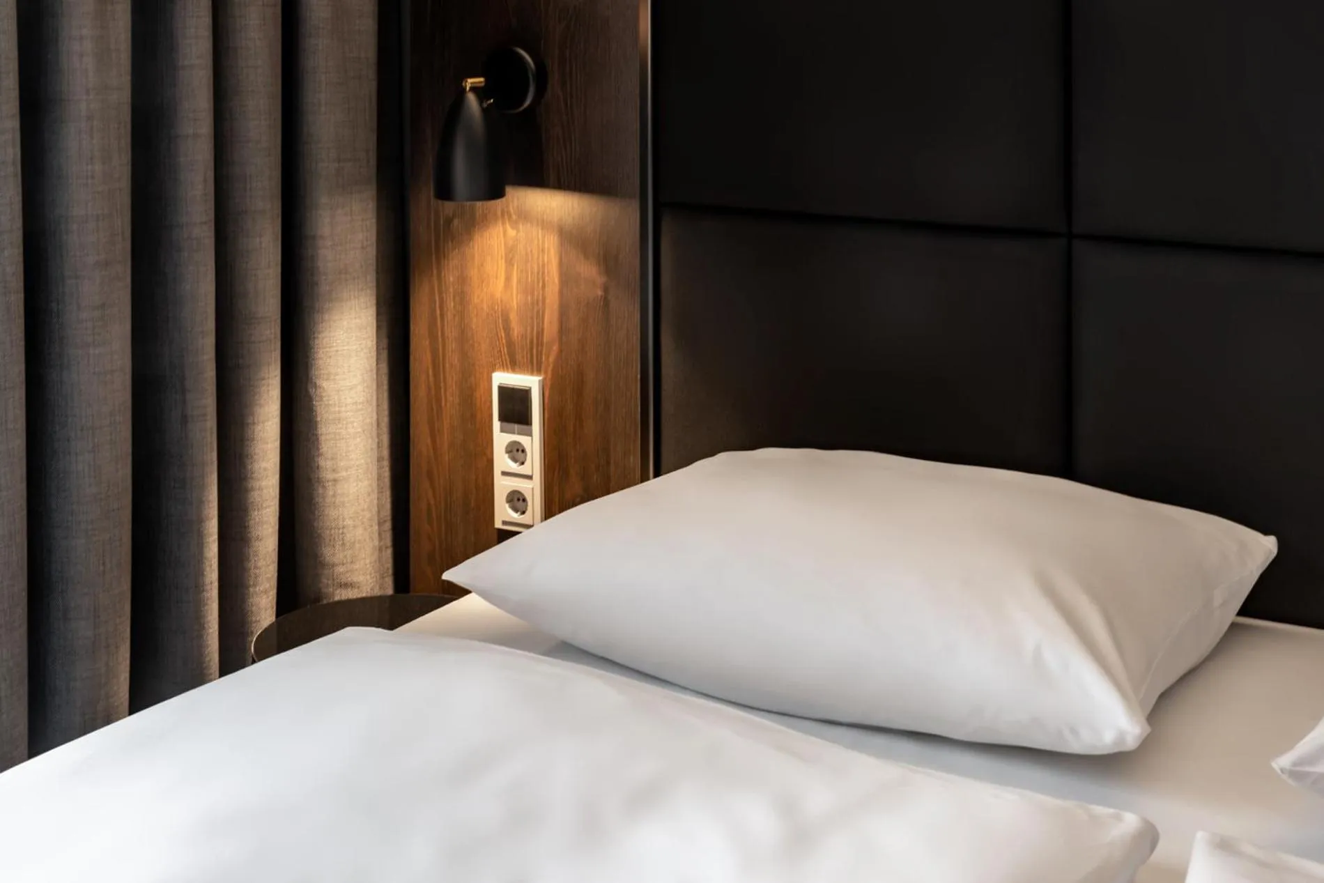 Bed in Hotel ROMY by AMANO