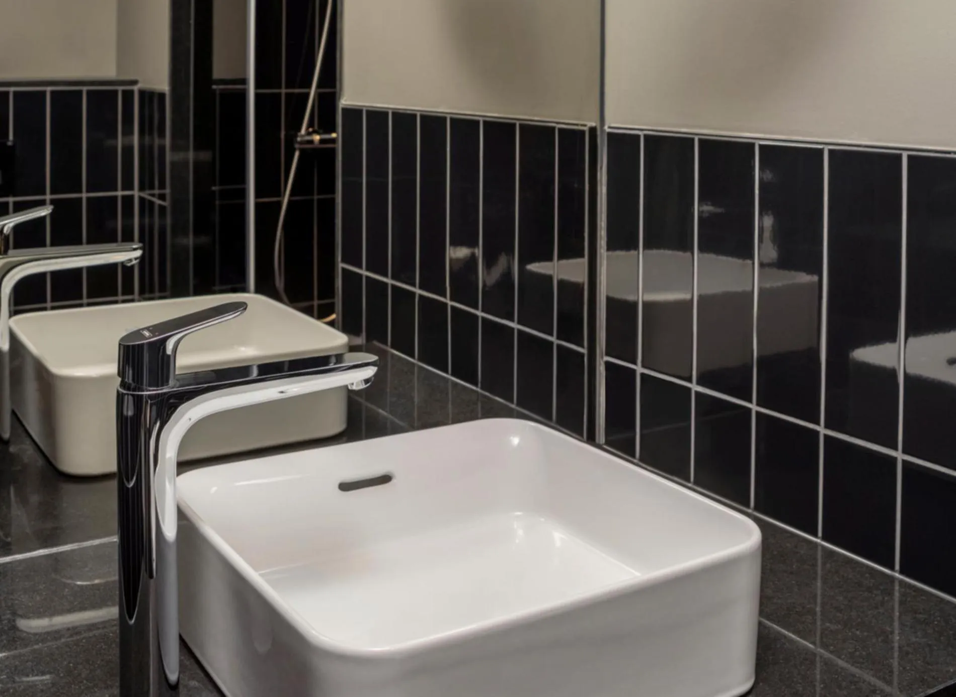 Bathroom in Hotel ROMY by AMANO