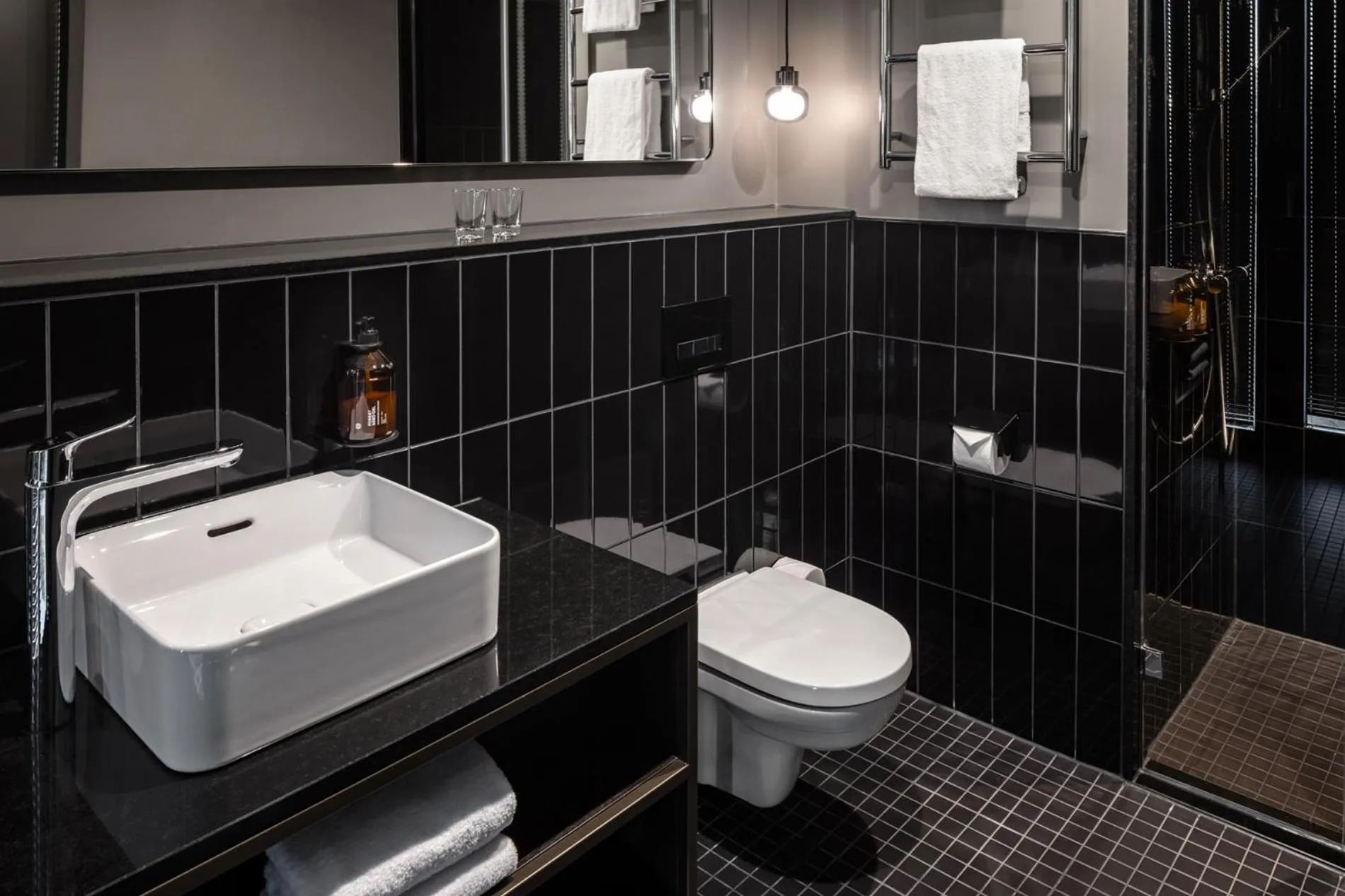 Bathroom in Hotel ROMY by AMANO