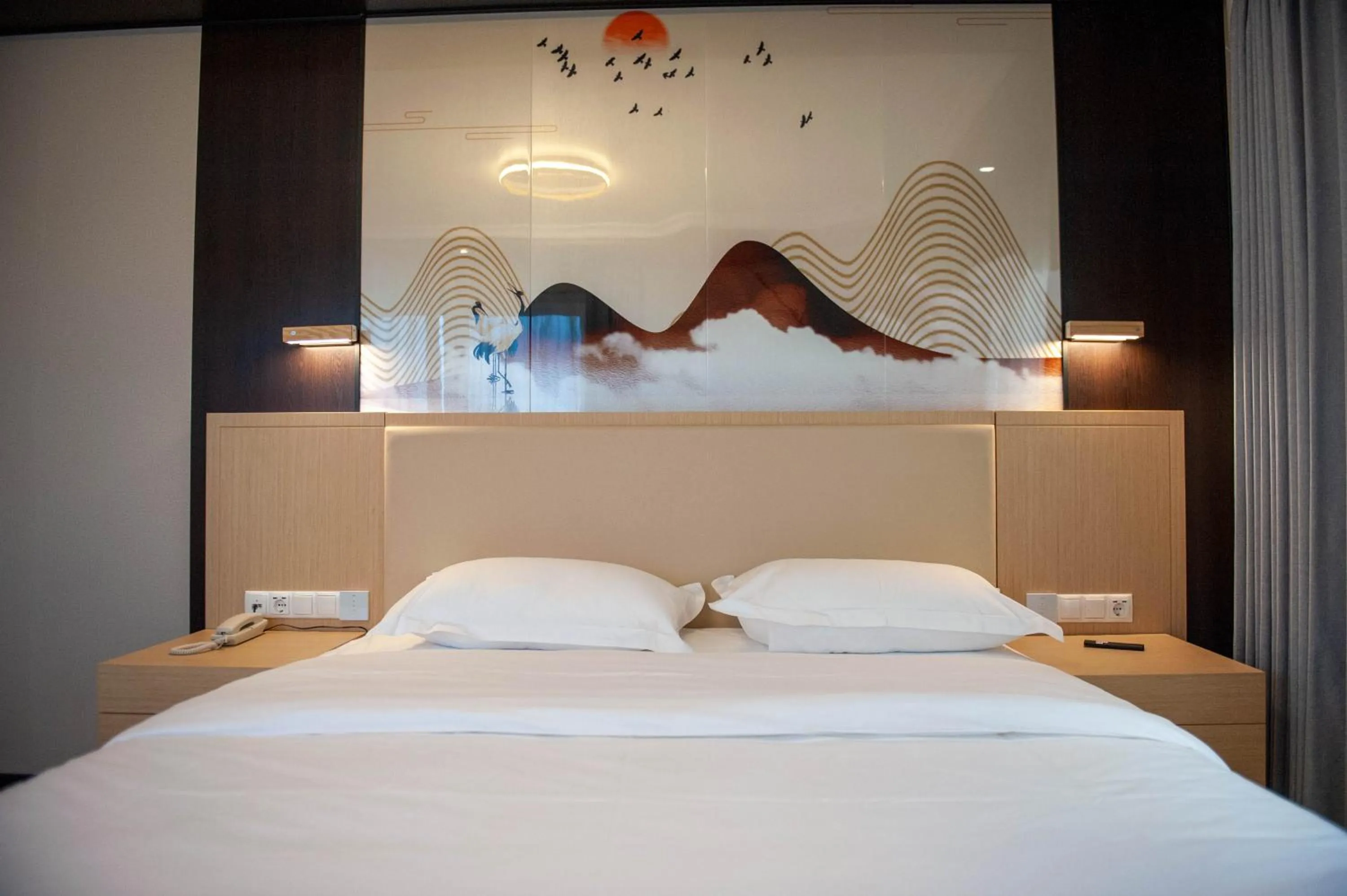 Bed in Mr.Liao Hotel