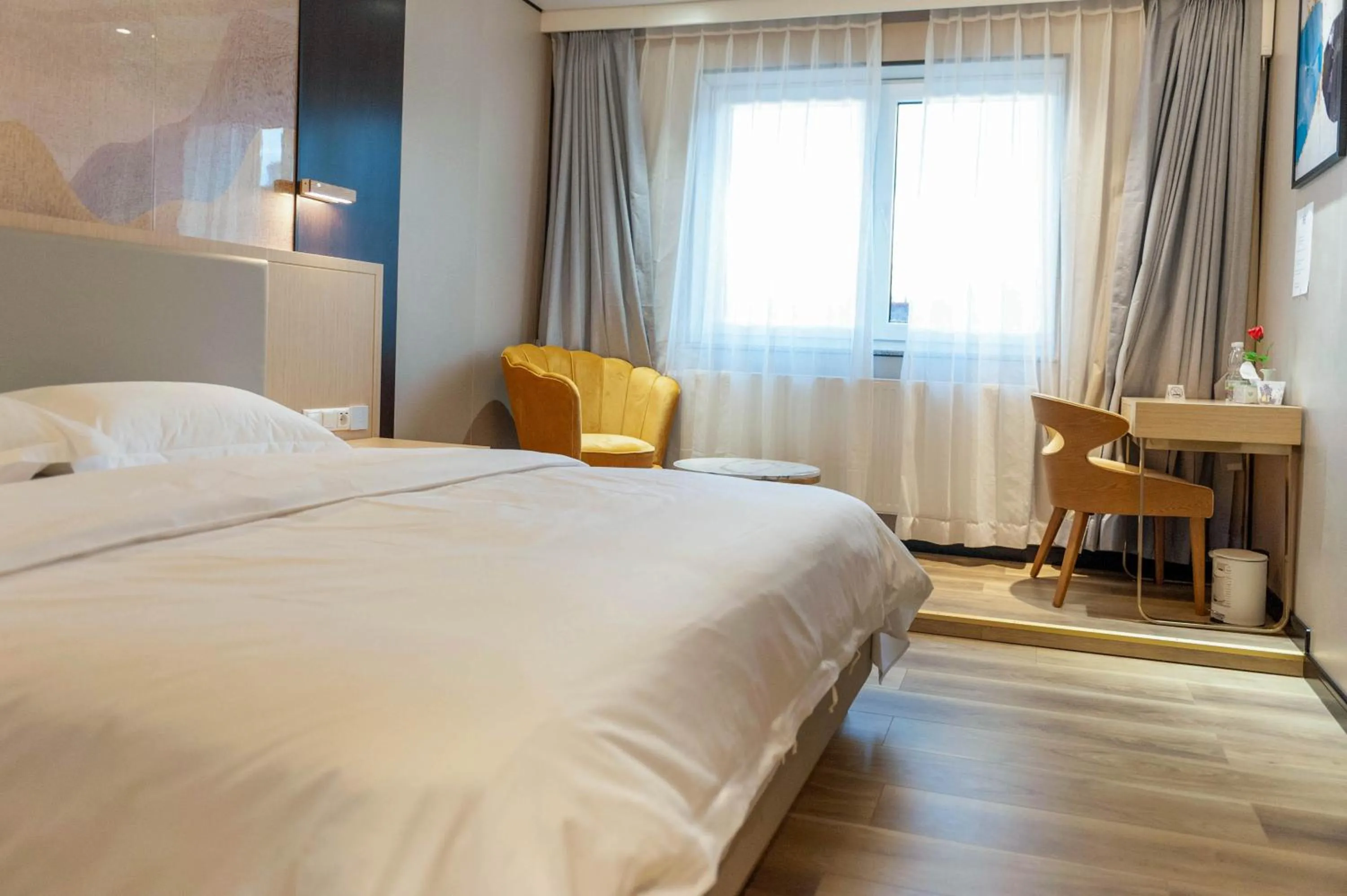 Bed in Mr.Liao Hotel