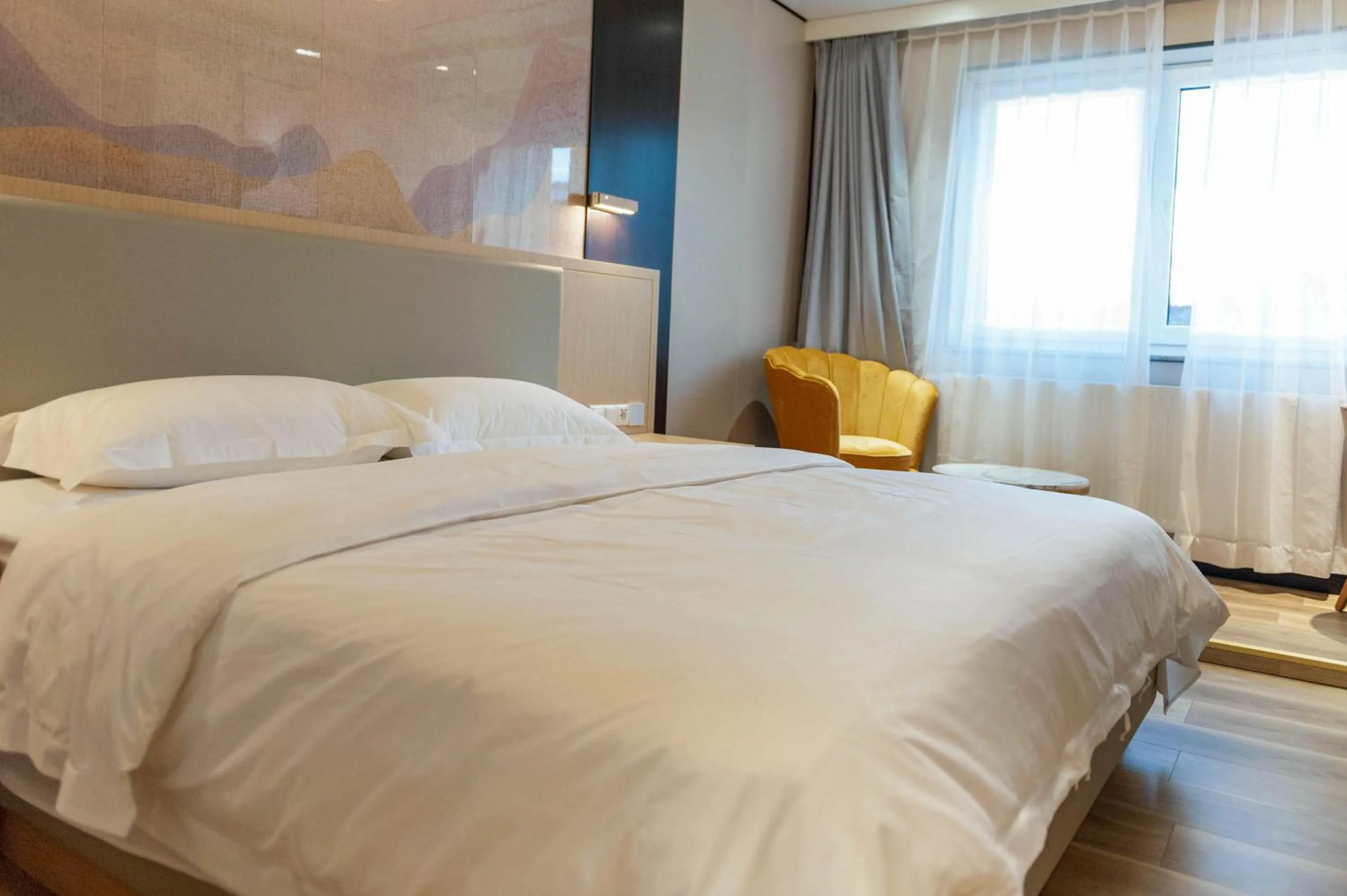 Bed in Mr.Liao Hotel