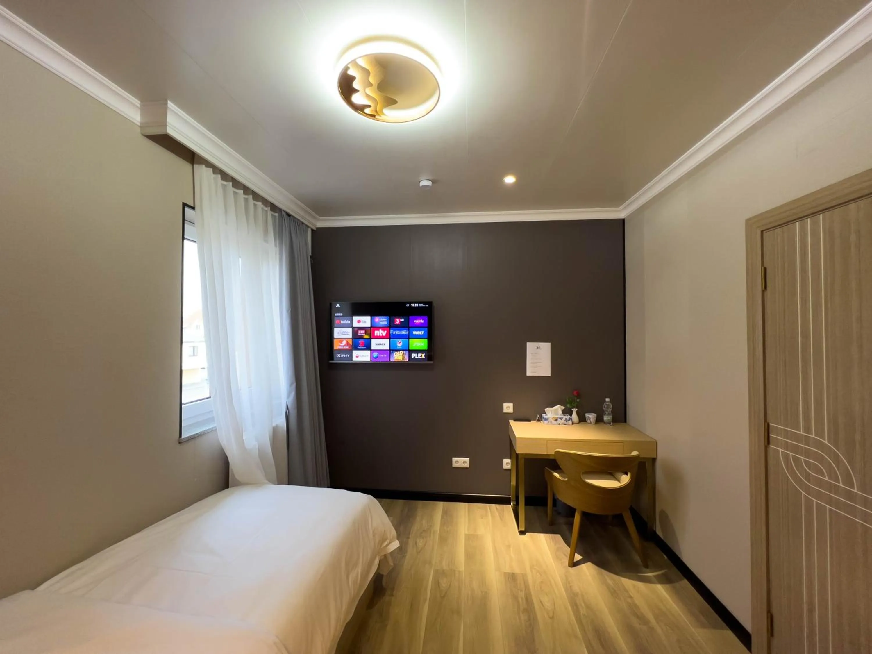 Bed in Mr.Liao Hotel