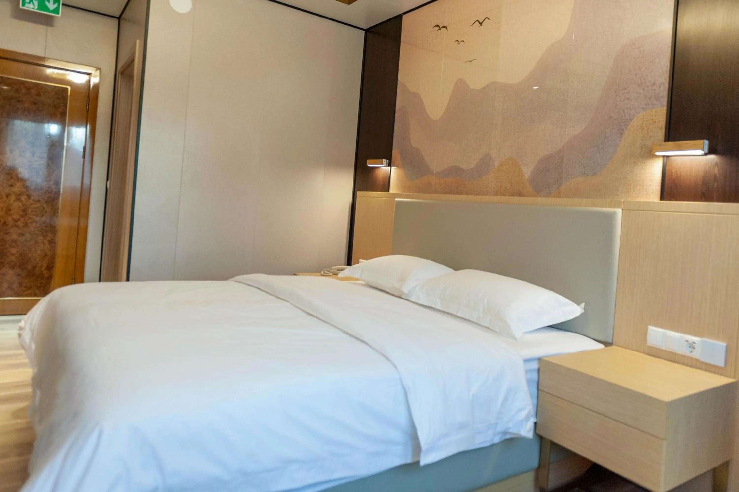 Bed in Mr.Liao Hotel