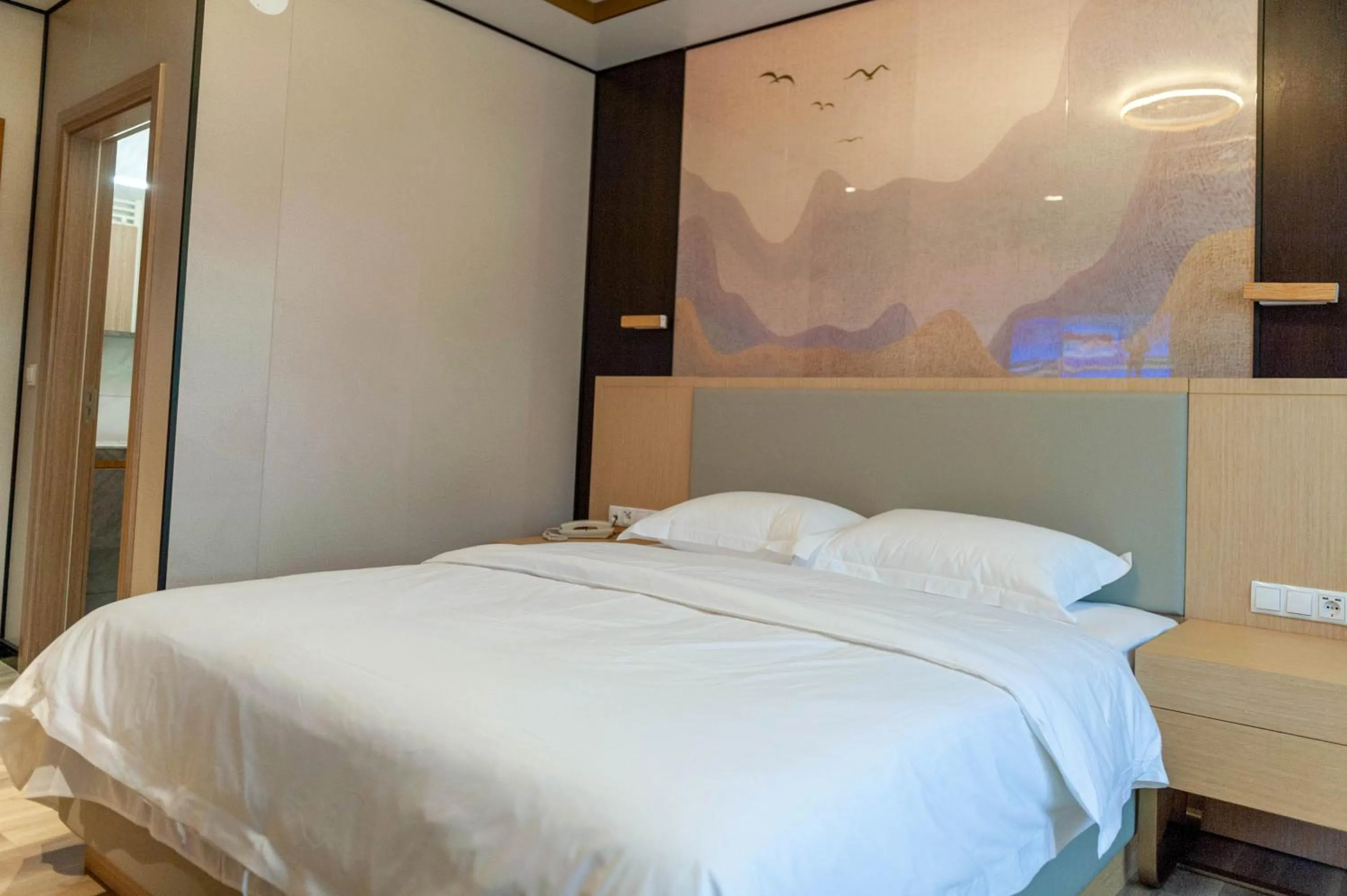 Bed in Mr.Liao Hotel