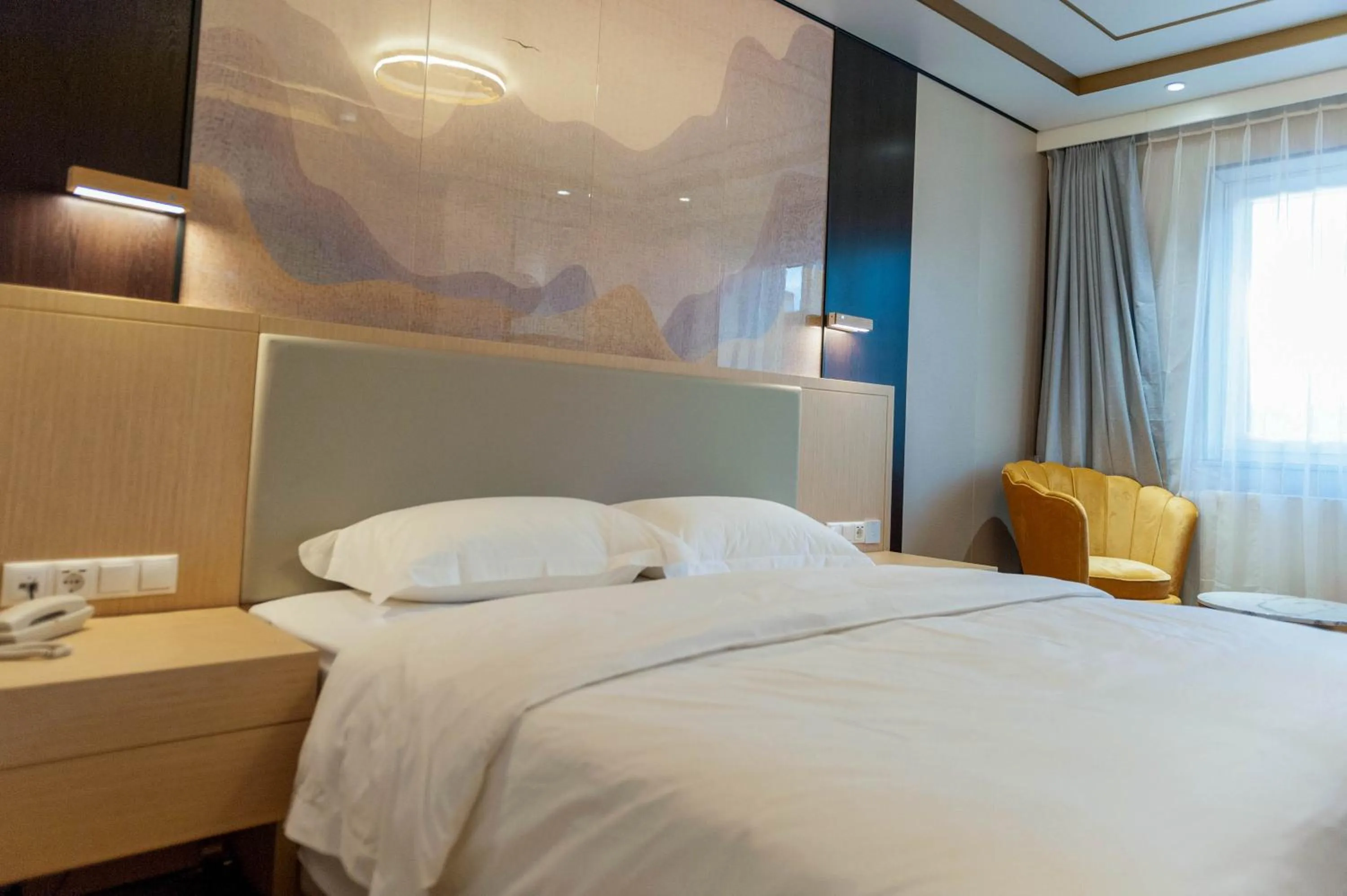 Bed in Mr.Liao Hotel