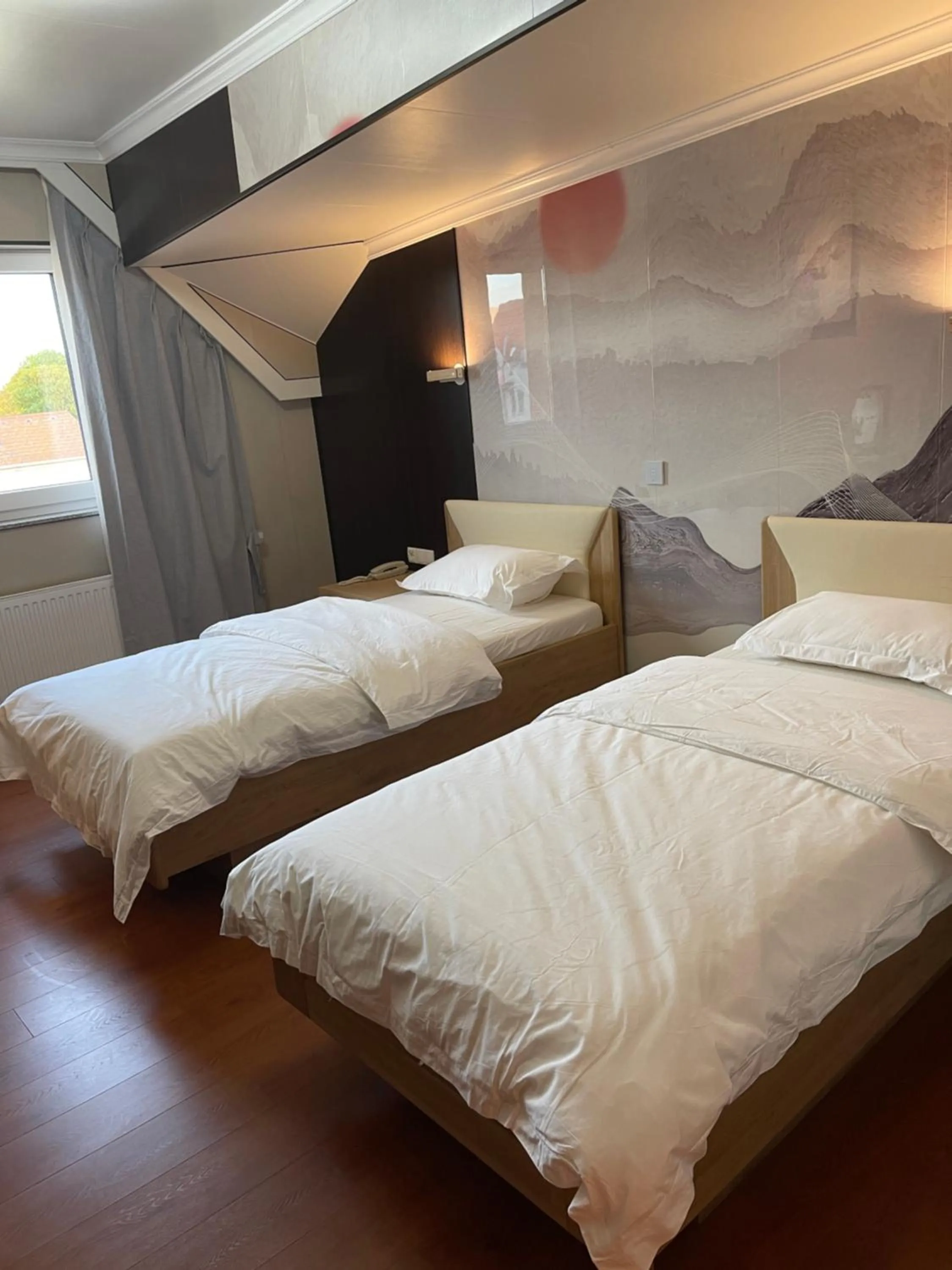 Bed in Mr.Liao Hotel