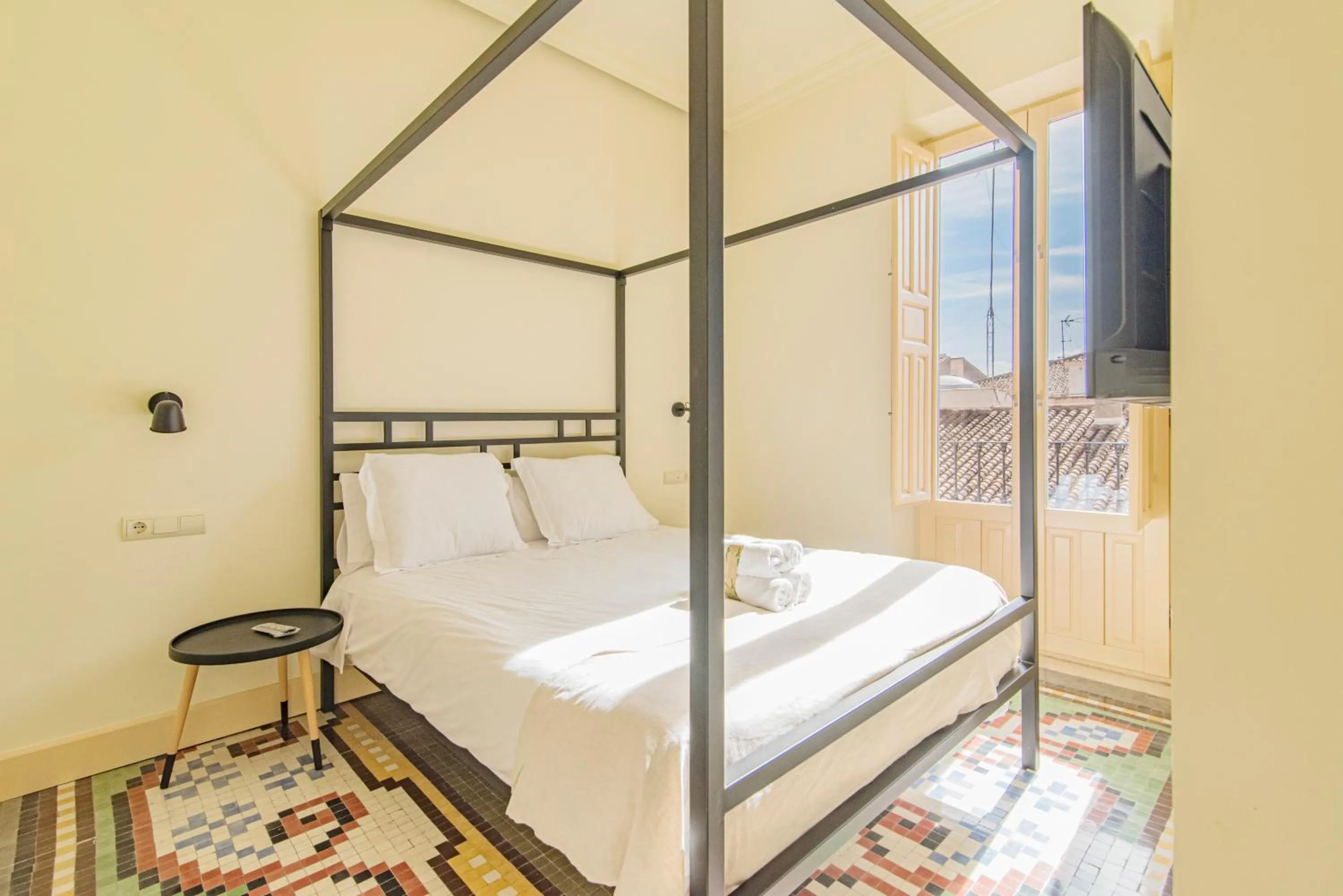 Bed in Mosaiko Homes Catedral Granada