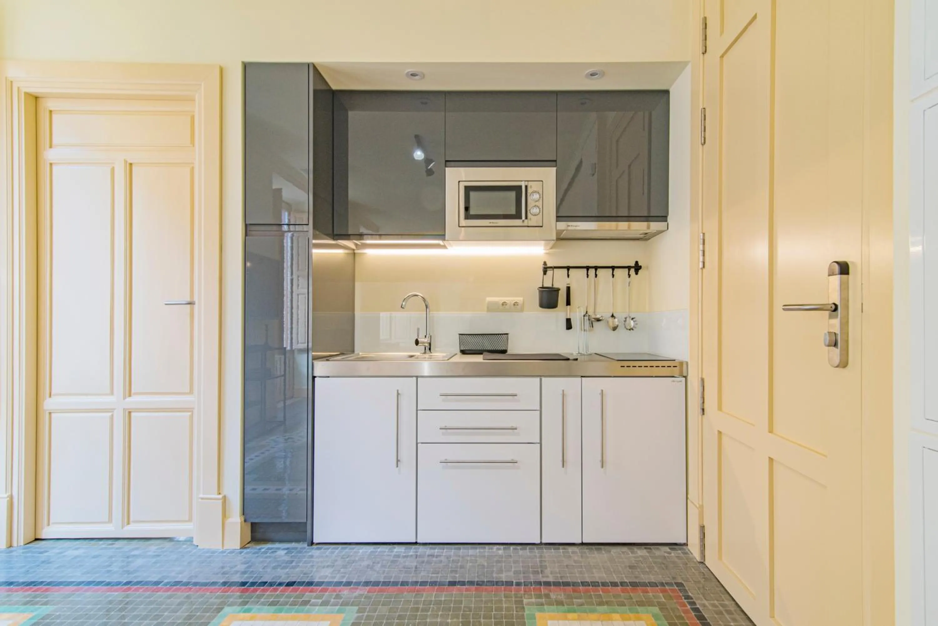 Kitchen or kitchenette in Mosaiko Homes Catedral Granada