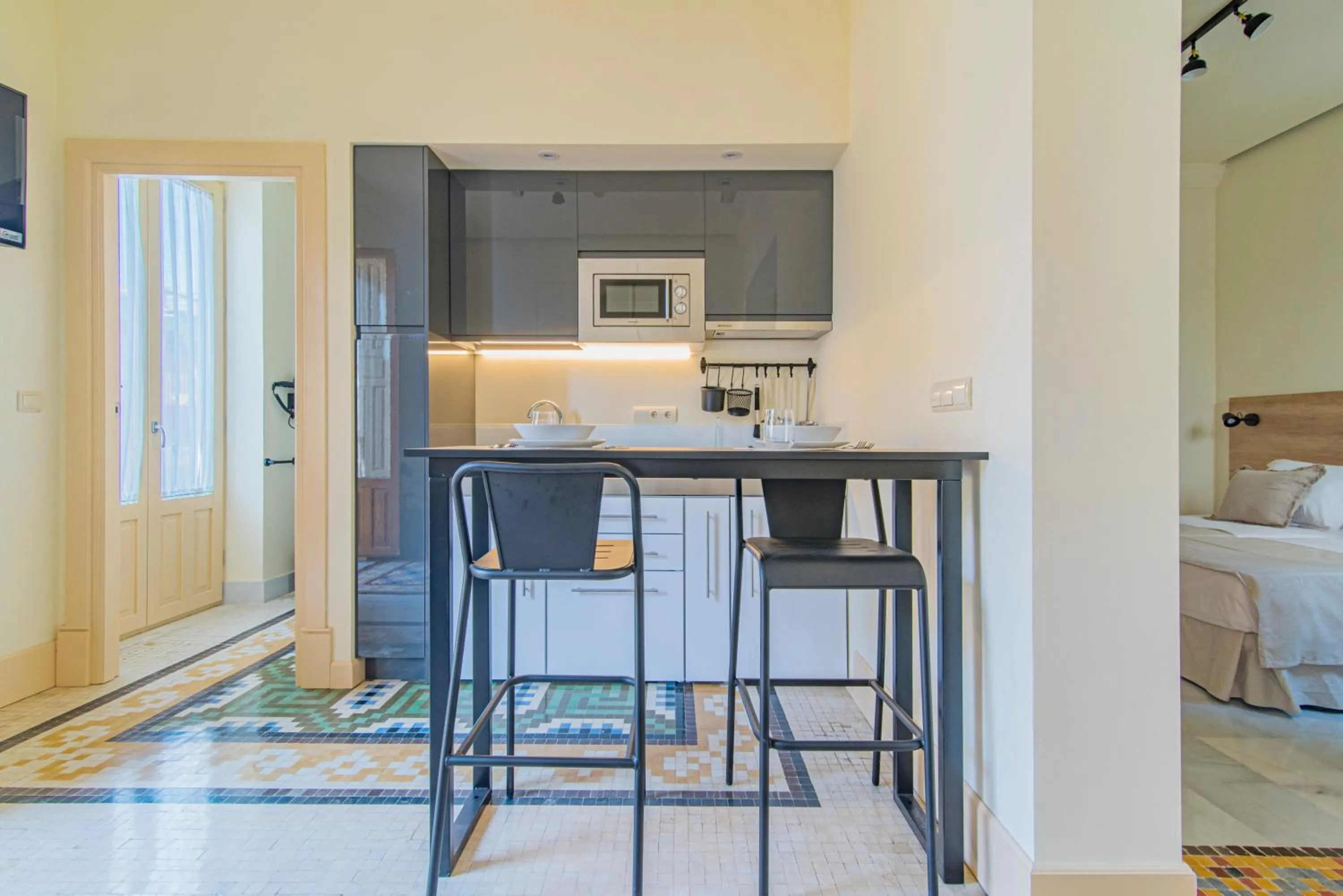 Kitchen or kitchenette, Bed in Mosaiko Homes Catedral Granada