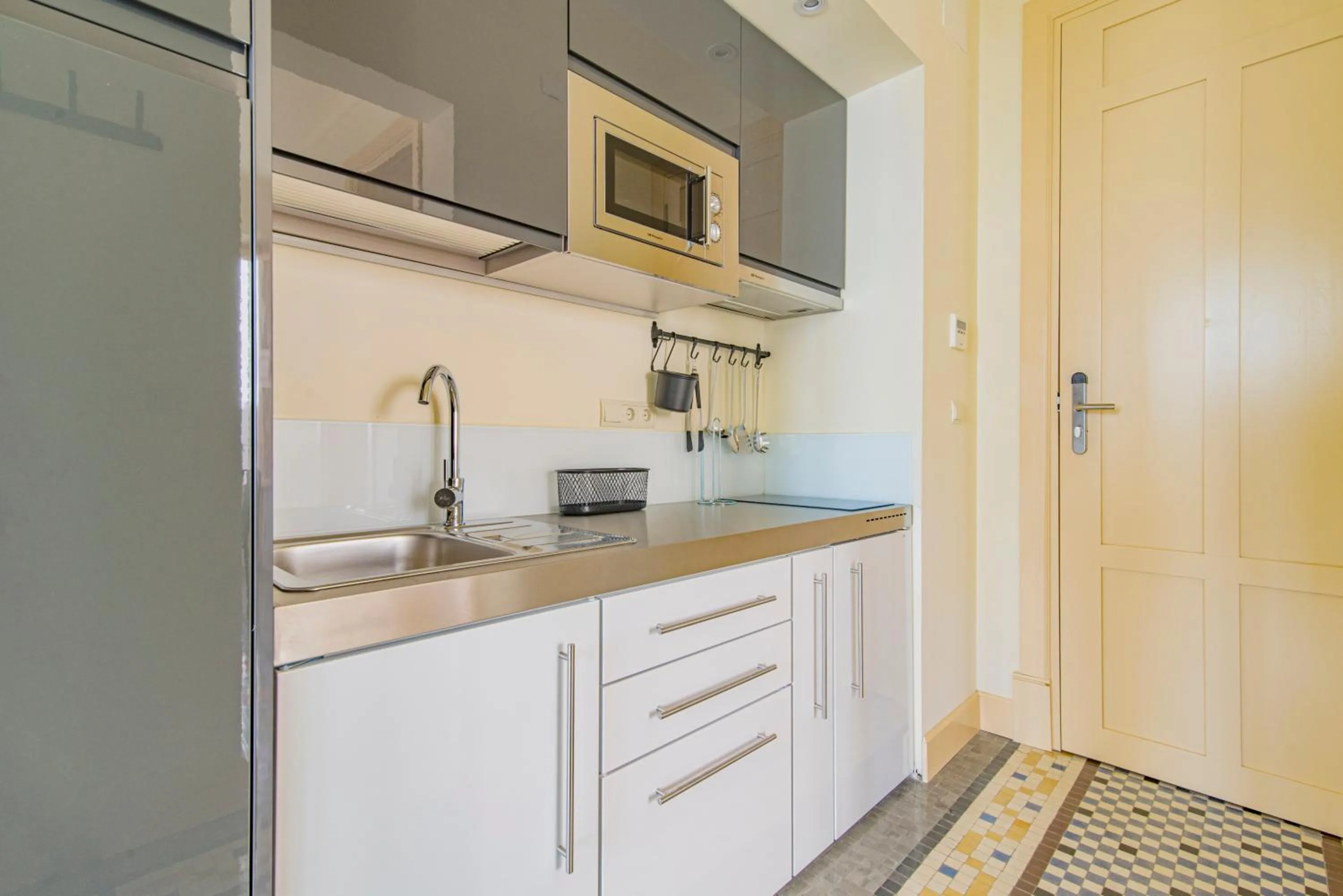 Kitchen or kitchenette in Mosaiko Homes Catedral Granada
