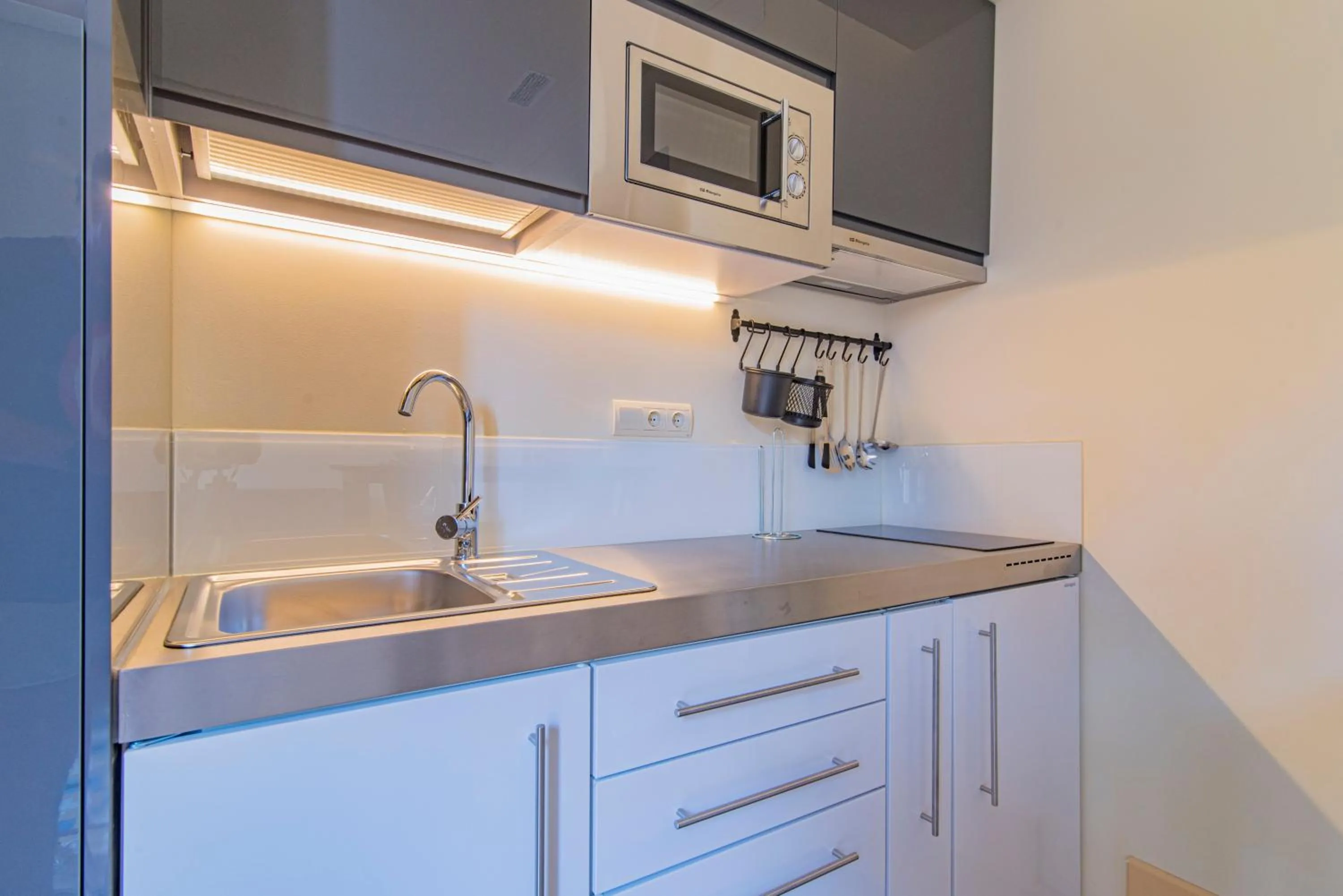 Kitchen or kitchenette in Mosaiko Homes Catedral Granada