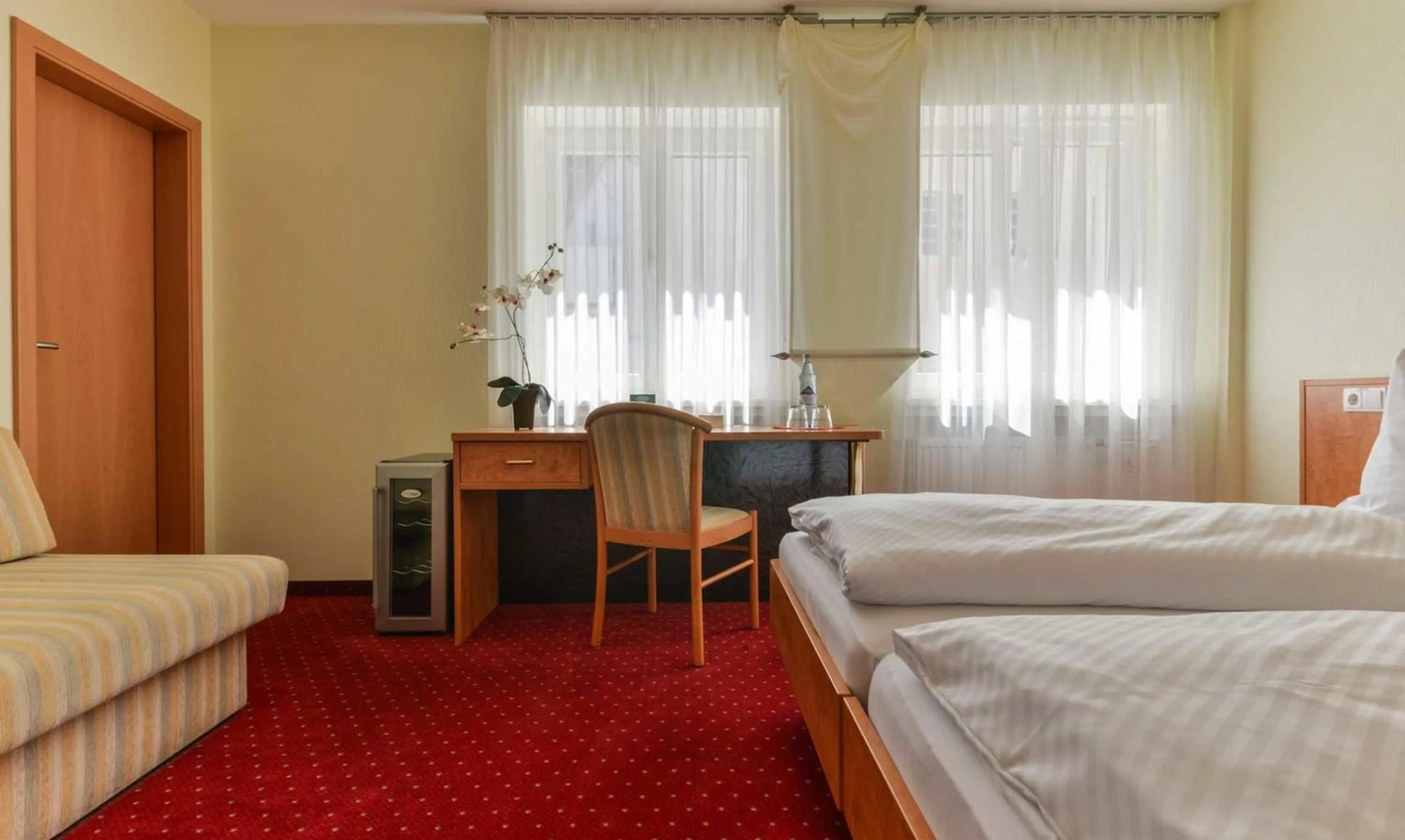 Bed in Hotel Kirchhainer Hof