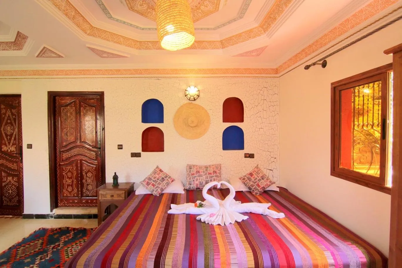 Photo of the whole room, Bed in Jnane Karma