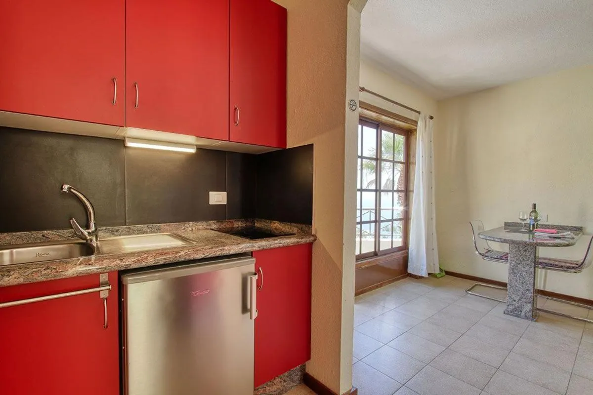 Kitchen or kitchenette in Bungalow Moijama el Drago