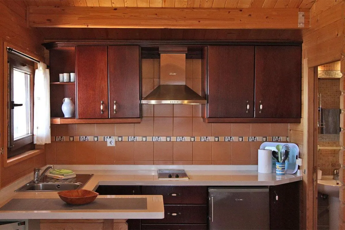 Kitchen or kitchenette in Bungalow Moijama el Drago