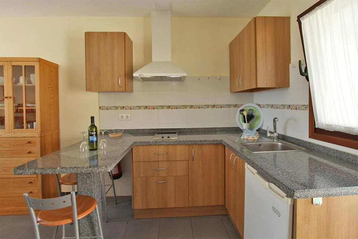 Kitchen or kitchenette in Bungalow Moijama el Drago